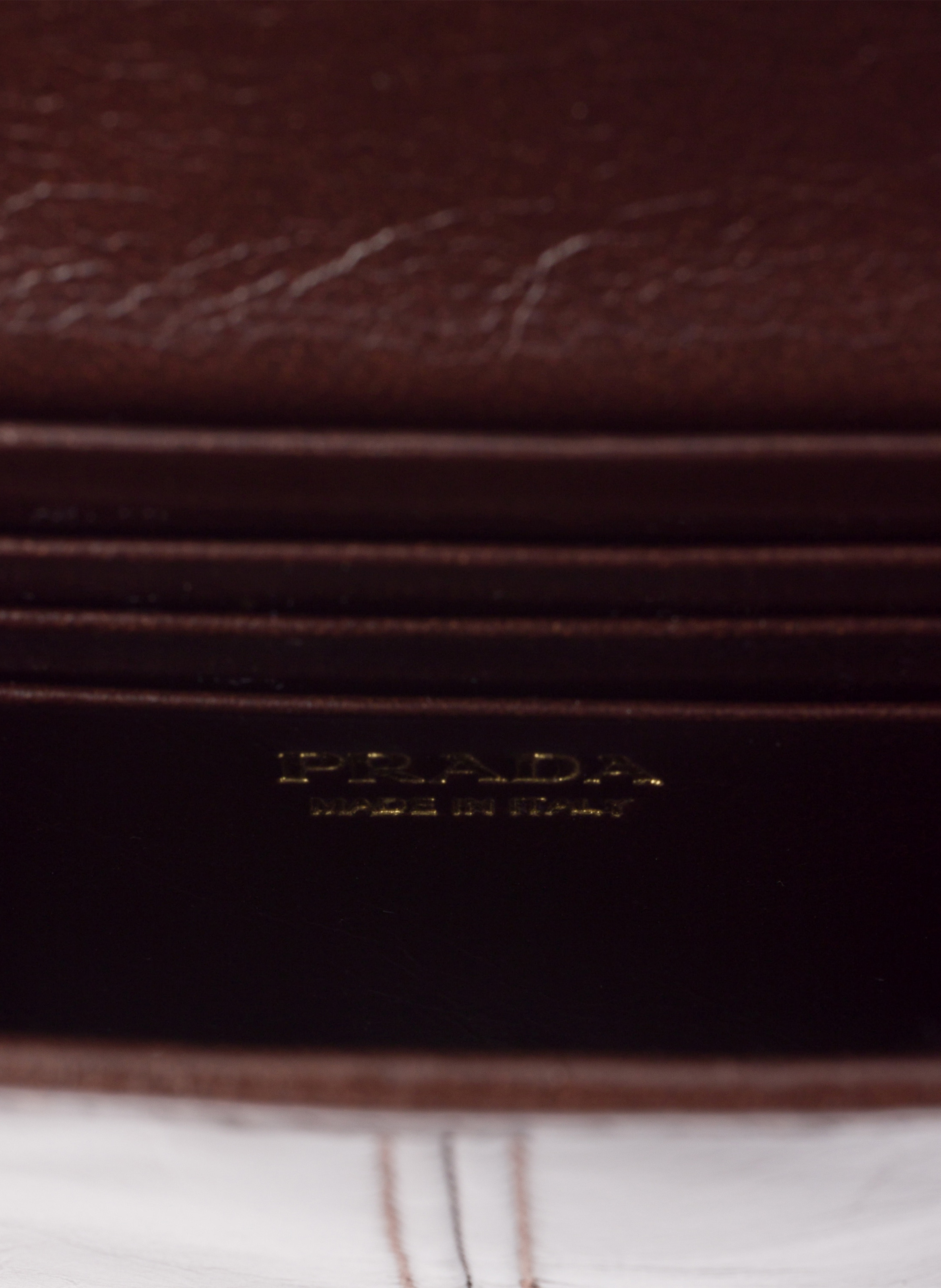 Porte-monnaie en cuir avec bandoulière PRADA Marron