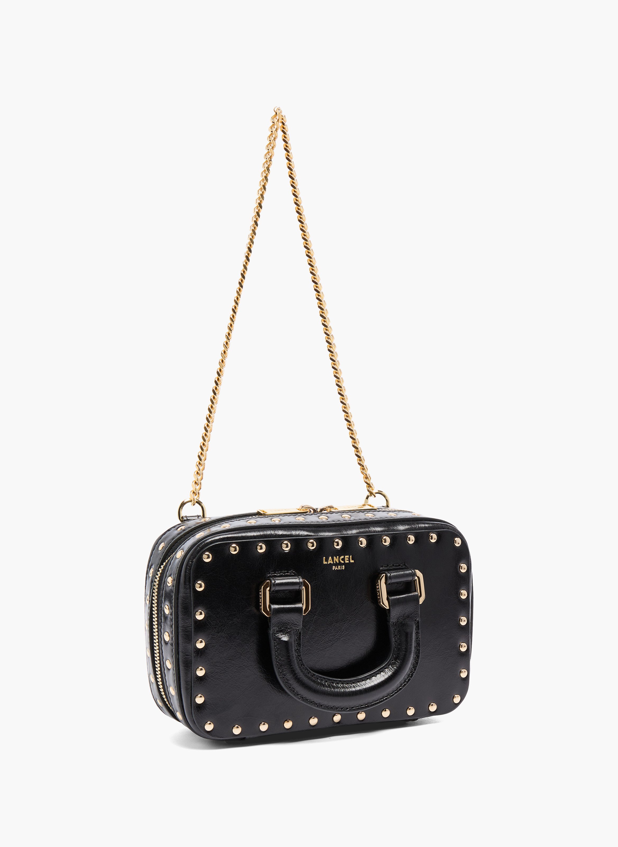 Petit sac vanity, cuir de vachette vintage avec clous. LANCEL Noir