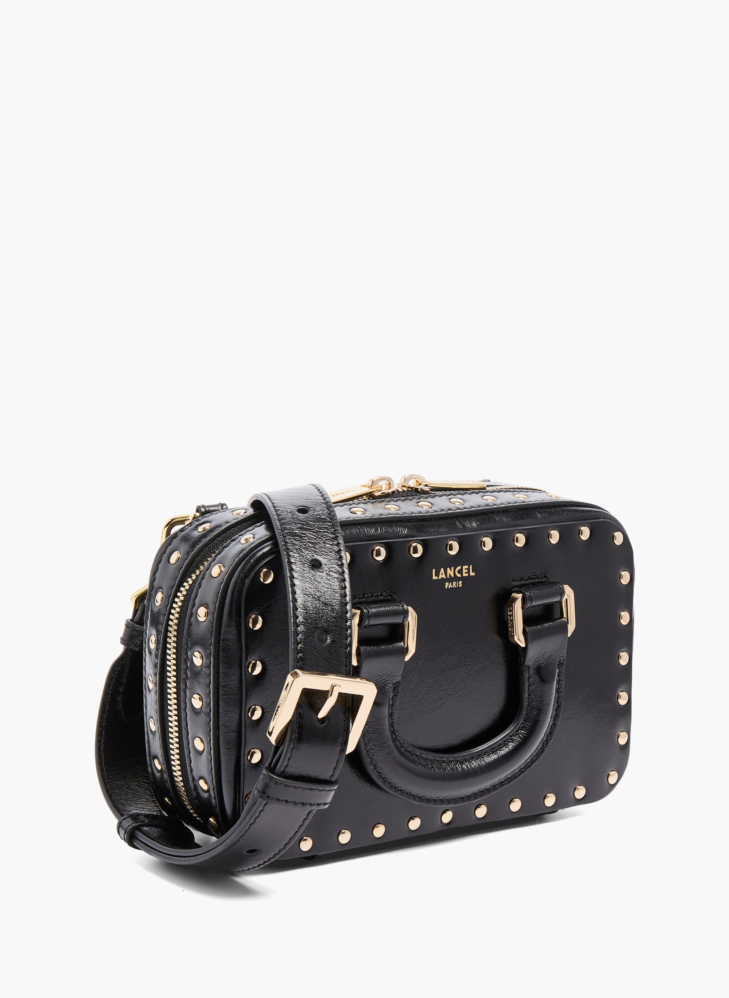 Petit sac vanity, cuir de vachette vintage avec clous. LANCEL Noir
