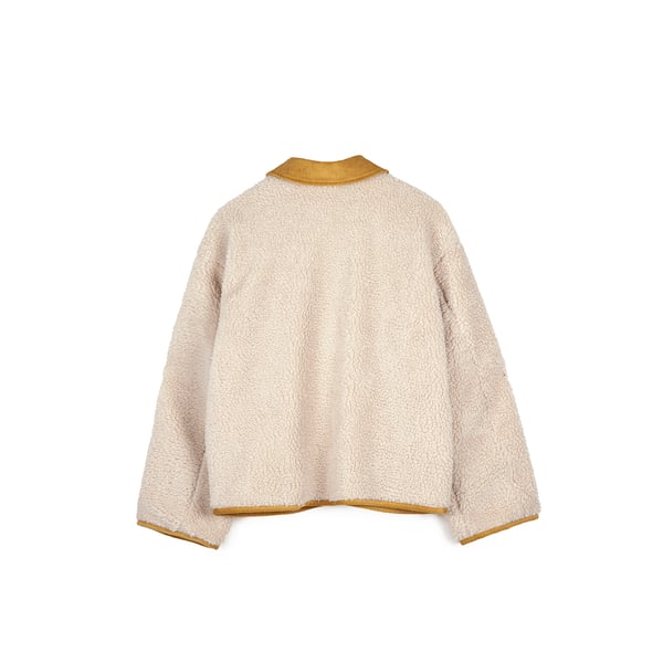 Veste en peau lainée