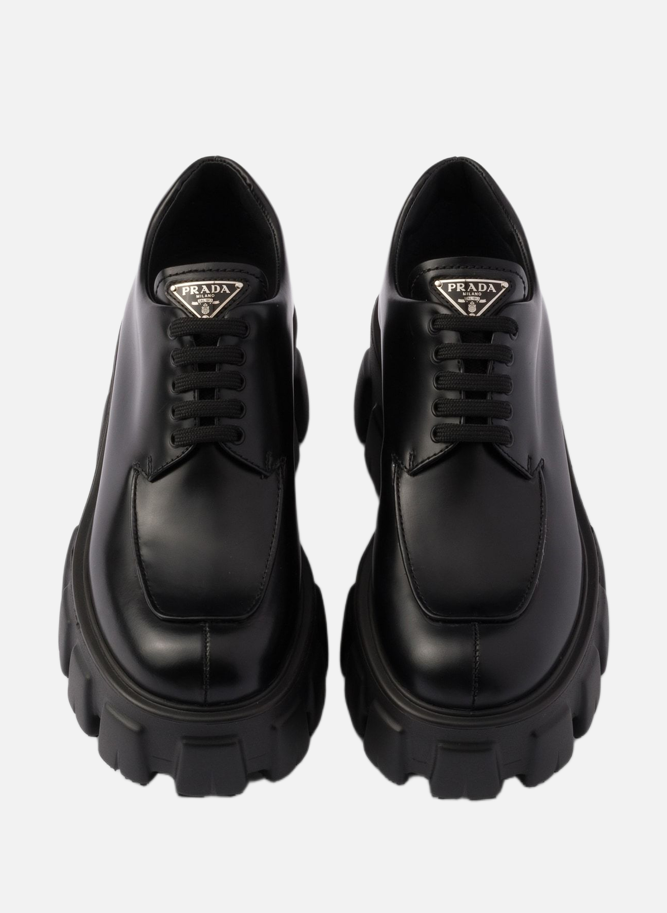 Chaussures à lacets monolith en cuir brossé PRADA Noir