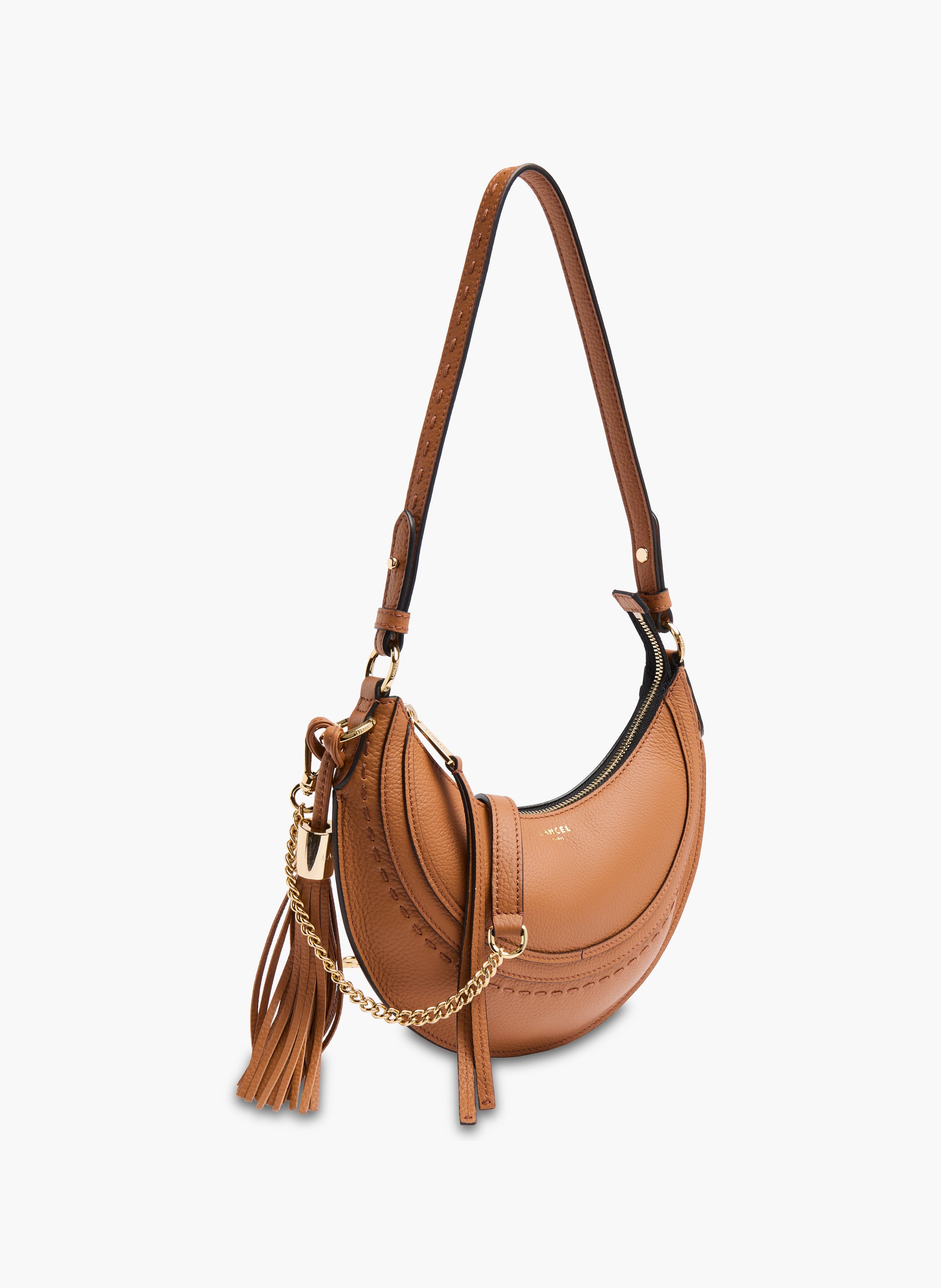 Sac hobohme zip - cuir grainé de vachette lancel, modèle compact à fermeture à glissière et torsade premier flirt. LANCEL Marron