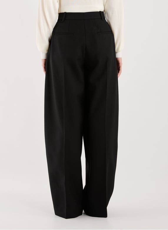 Pantalon ample en coton mélangé | Noir by JACQUEMUS Pantalon ample en coton mélangé Noir