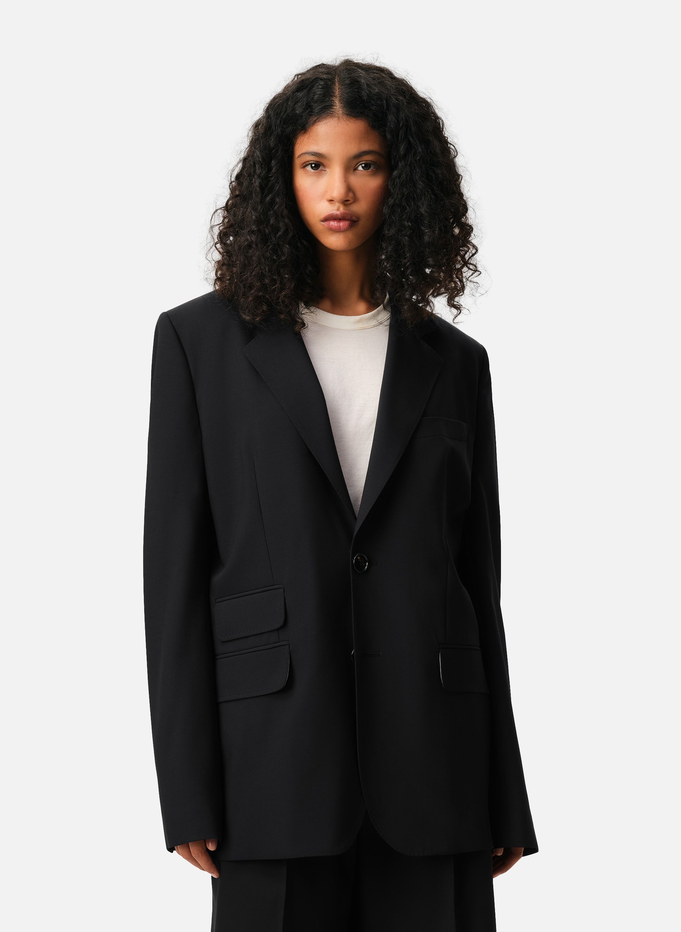 Veste boxy simple boutonnage en laine vierge NoirAMI PARIS