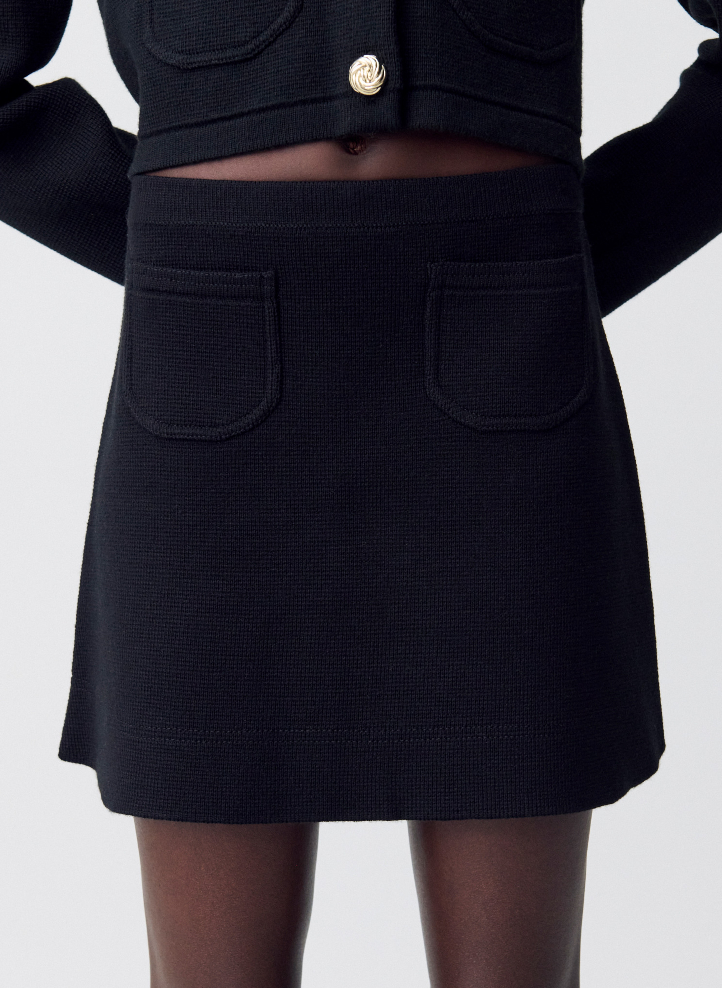 Jupe courte trapèze unie en laine mélangée CLAUDIE PIERLOT Noir