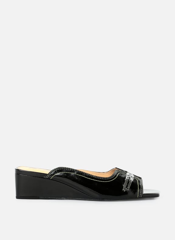 Mules à talon compensé en cuir Naplack Noir by GANNI GANNI Mules à talon compensé en cuir Naplack Noir