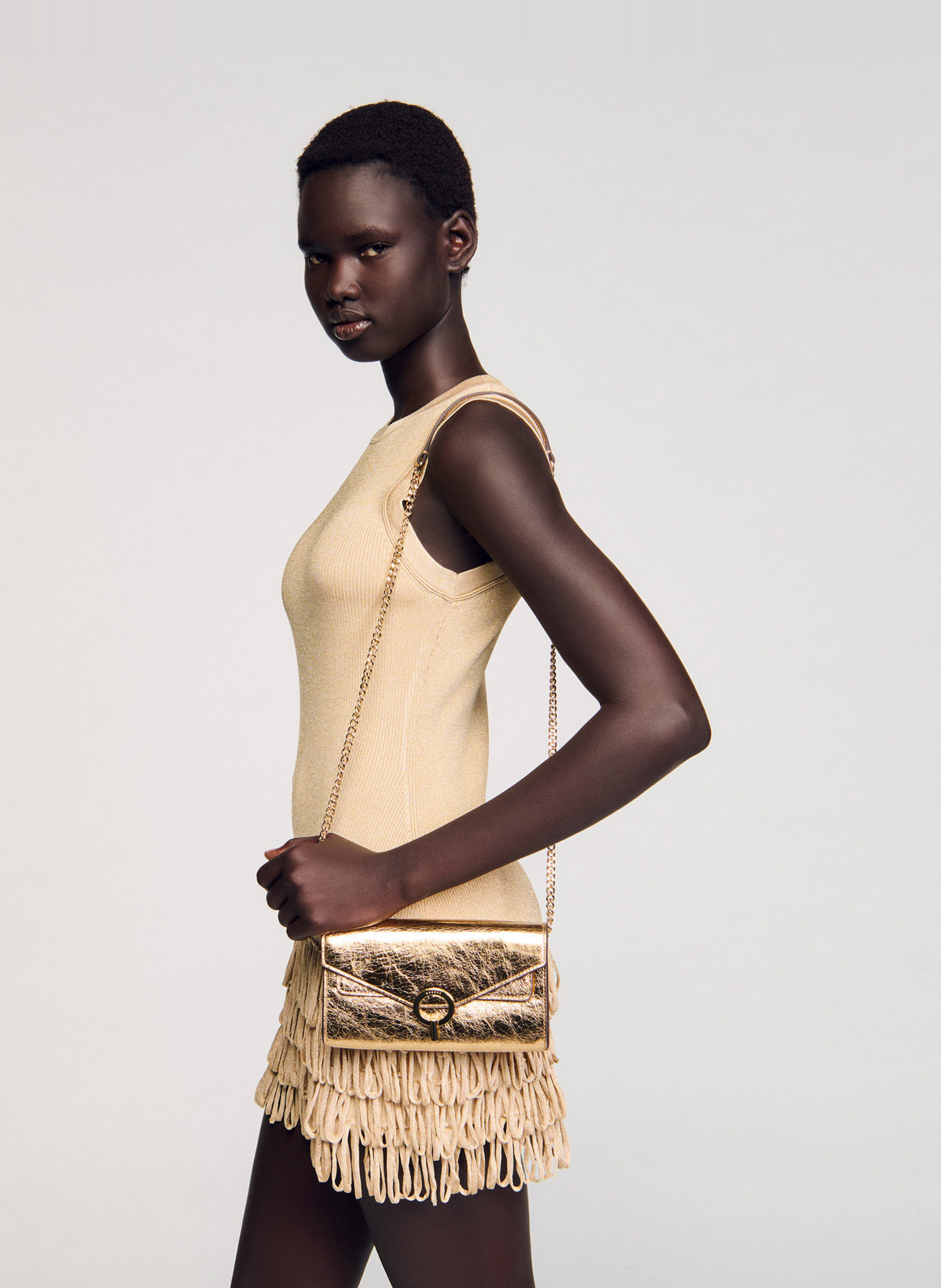 Pochette en cuir métallisé yza SANDRO Doré