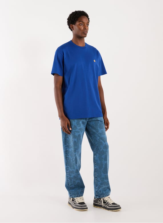 Jean imprimé fleuri en coton | Bleu by CARHARTT WIP Jean imprimé fleuri en coton Bleu