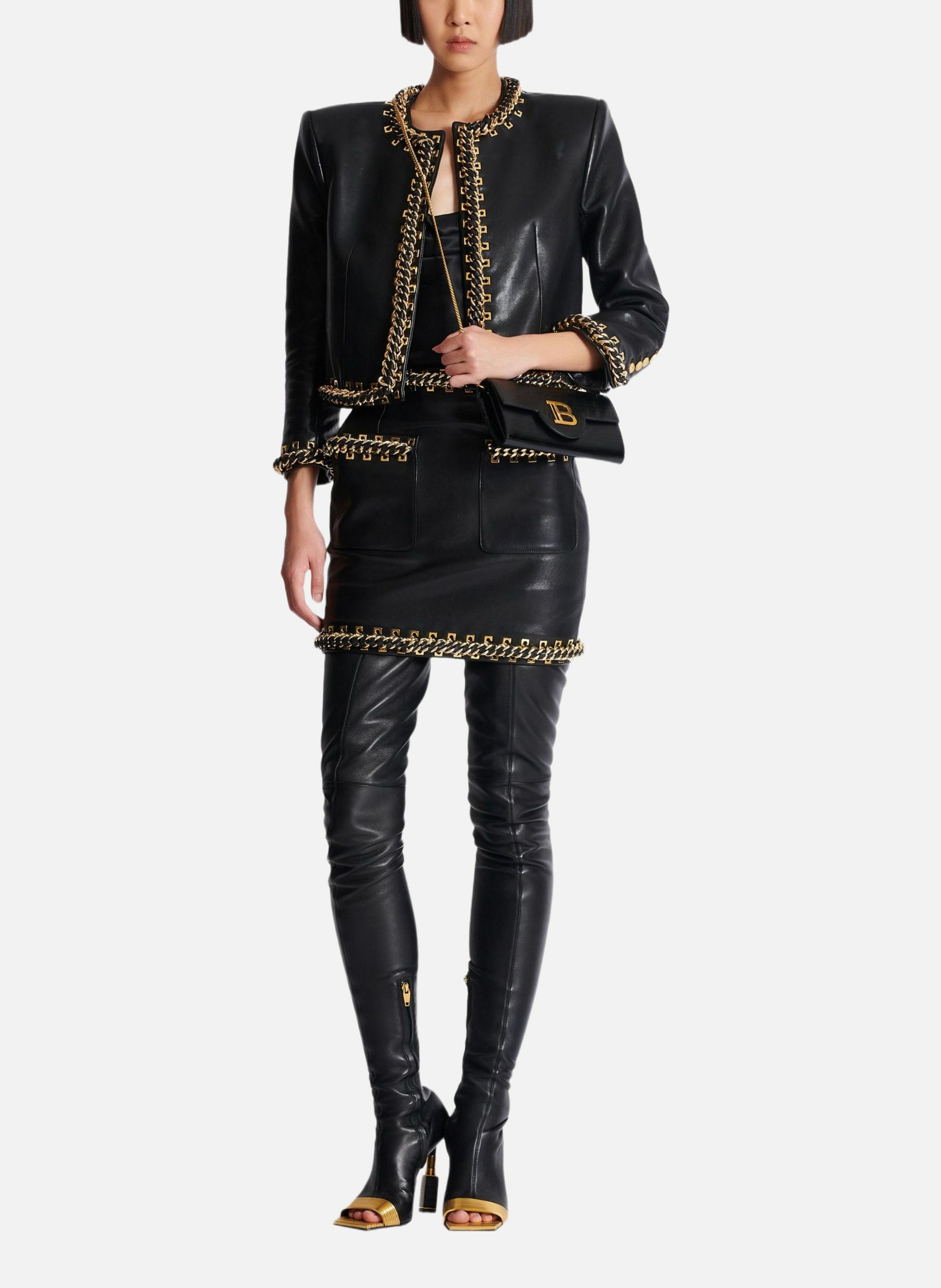 Jupe courte en cuir d'agneau avec chaînes BALMAIN Noir