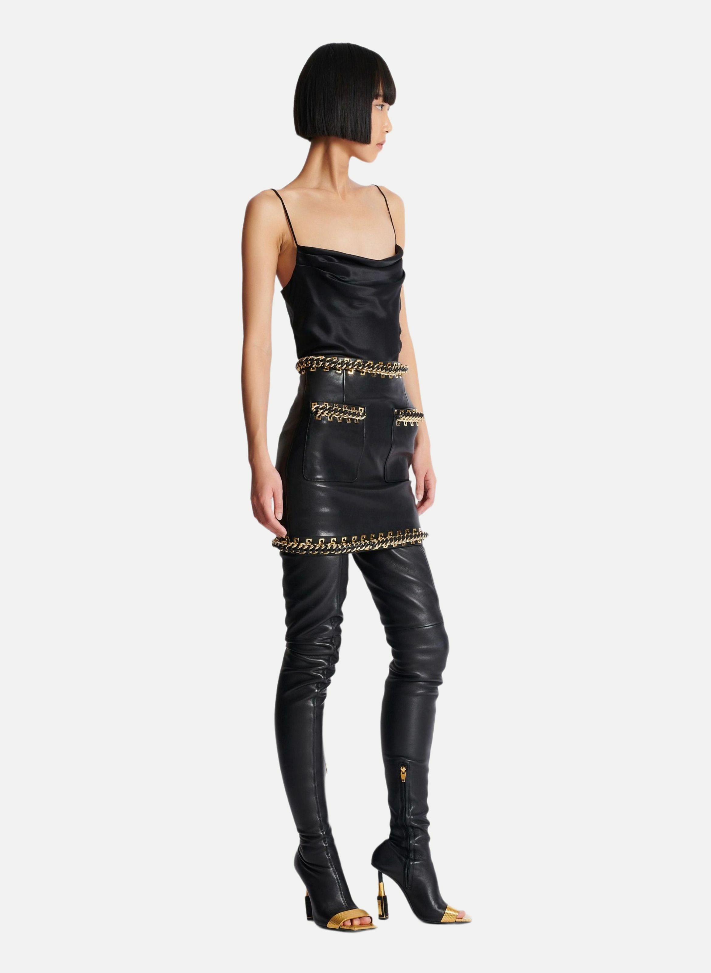 Jupe courte en cuir d'agneau avec chaînes BALMAIN Noir
