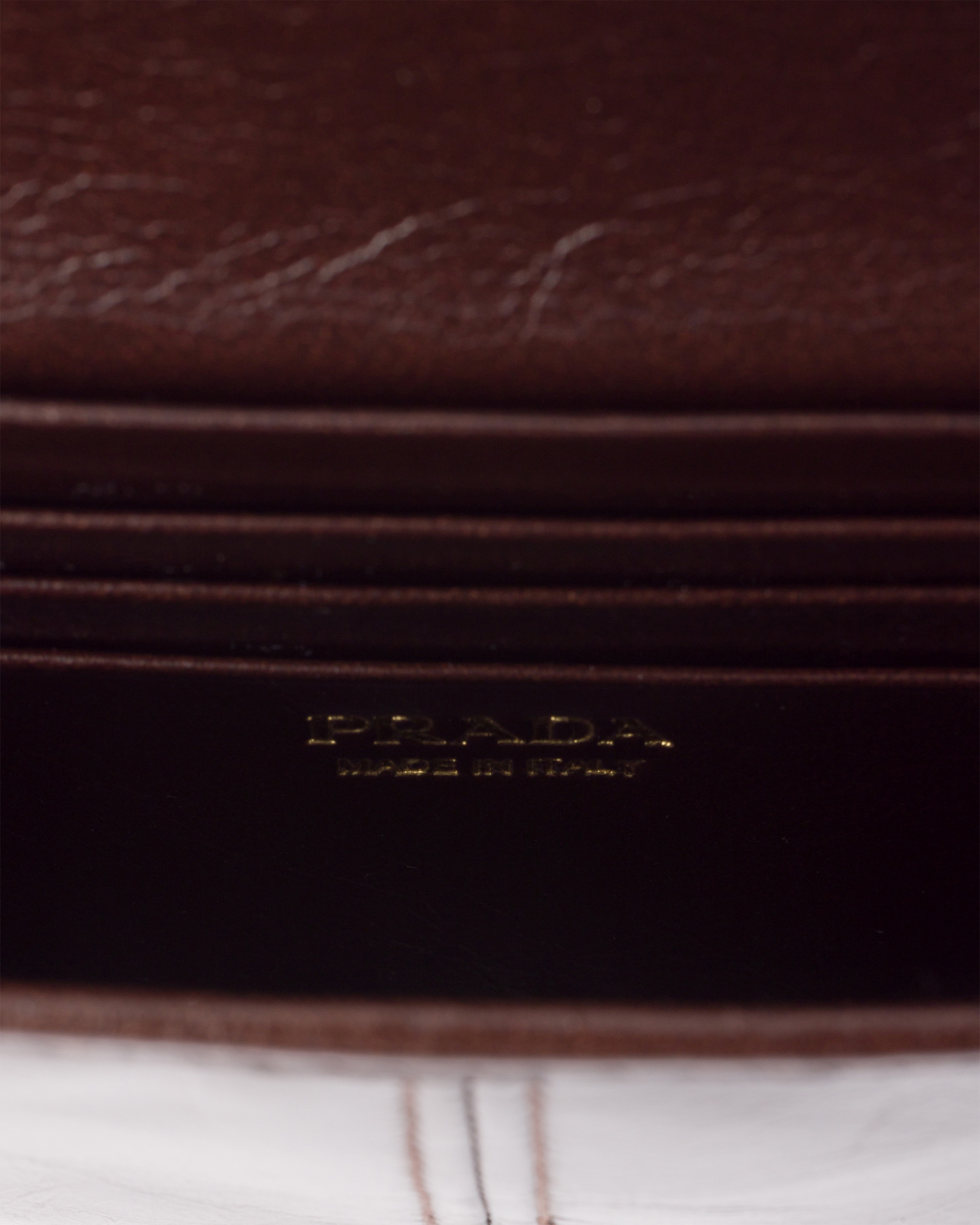 Porte-monnaie en cuir avec bandoulière PRADA Marron