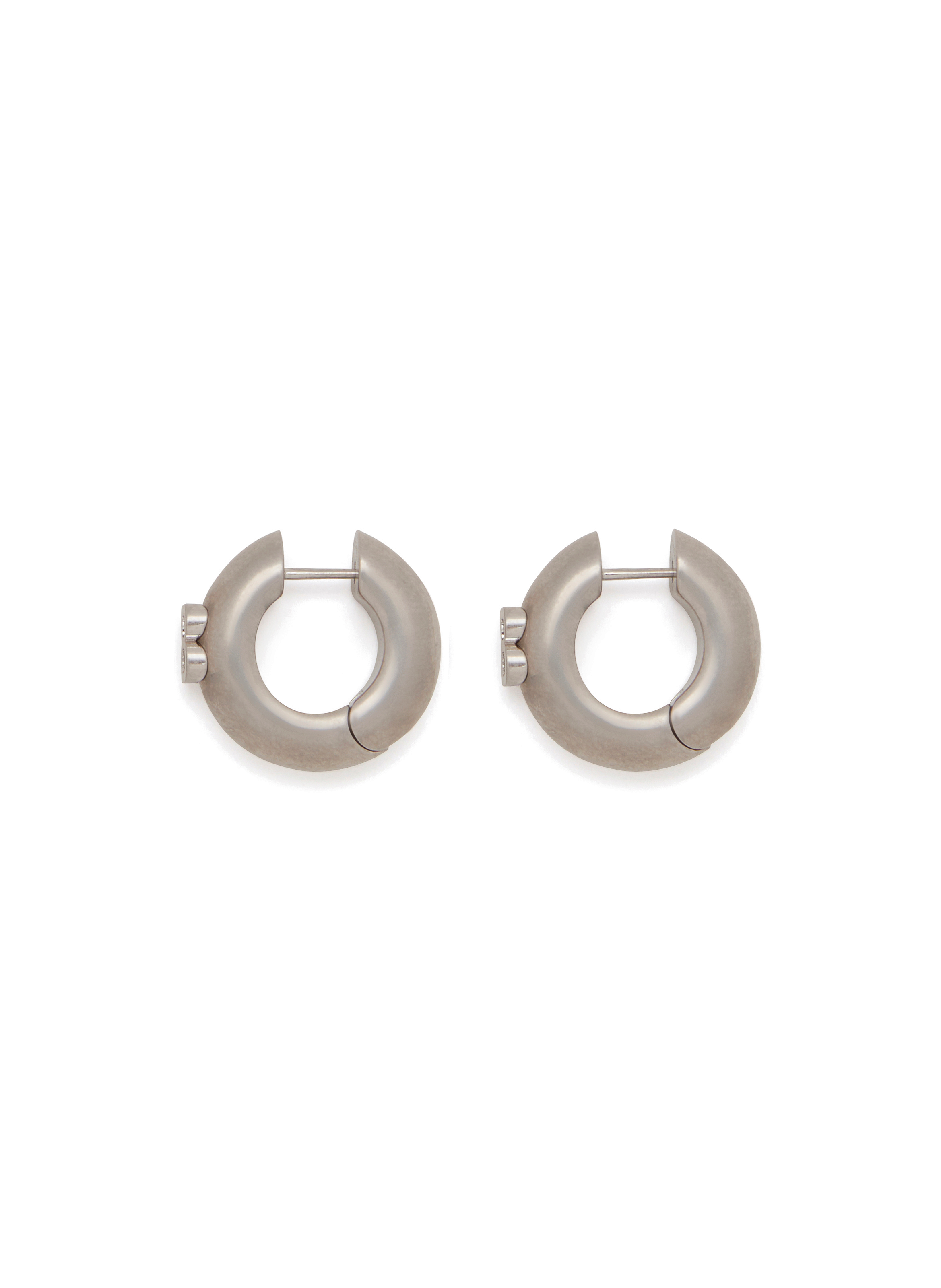 Boucles d'oreille B. en laiton