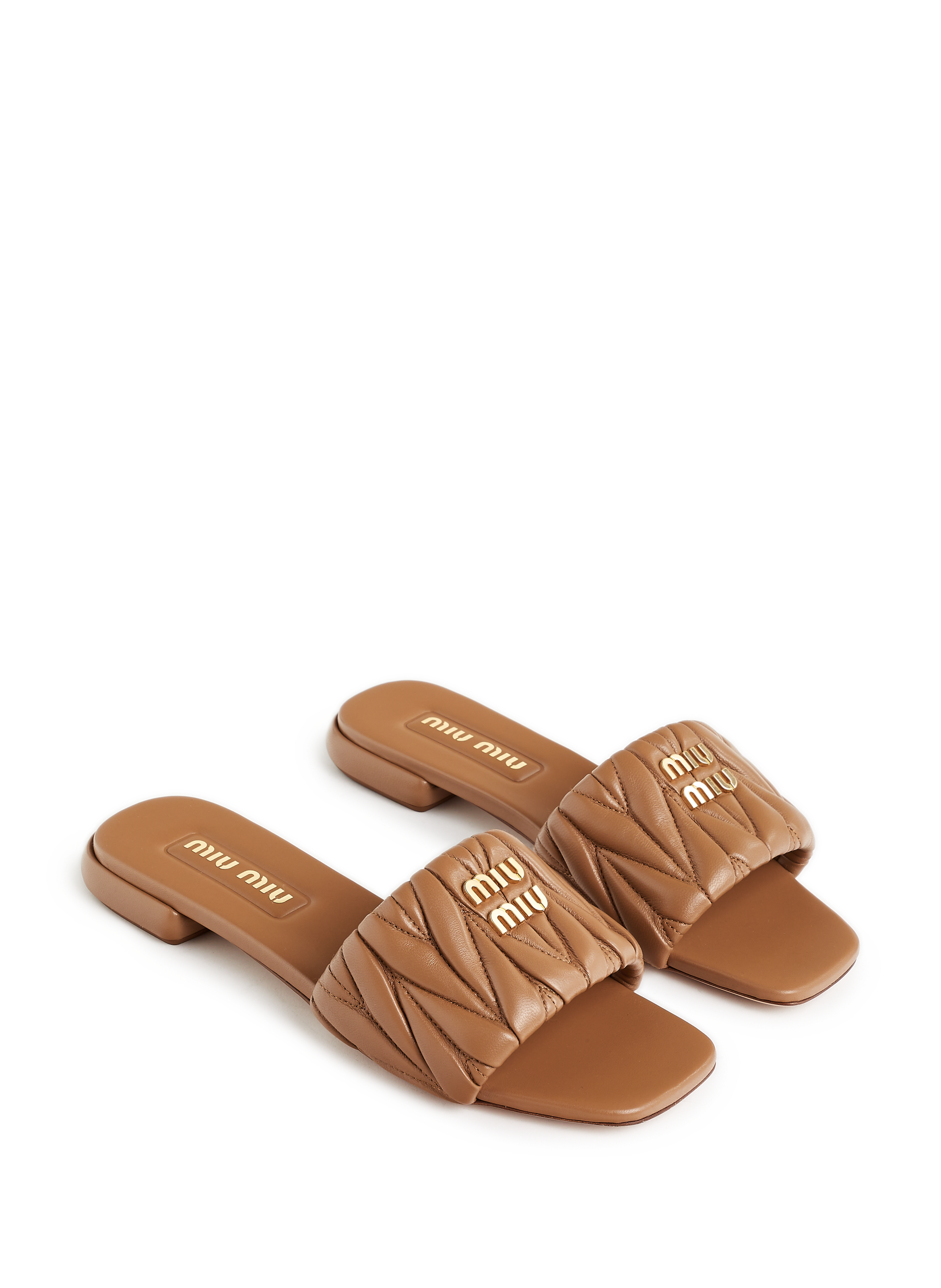 Quilted leather mules MIU MIU Brown