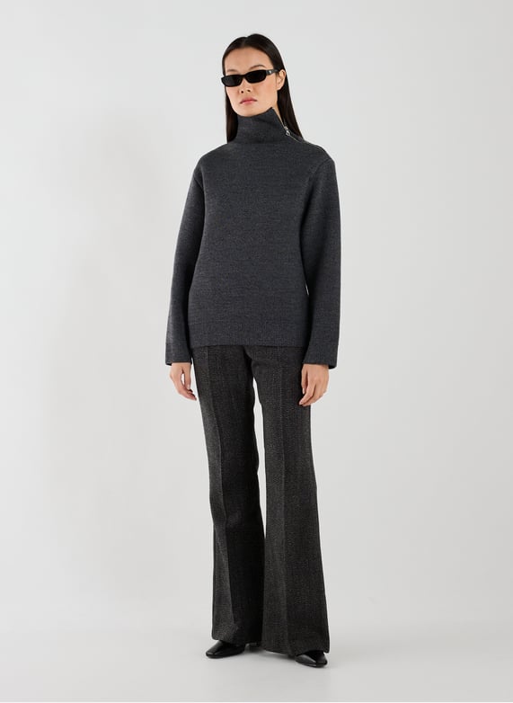 Boot-cut wool woven trousers | Black by COURRÈGES Boot-cut wool woven trousers Black