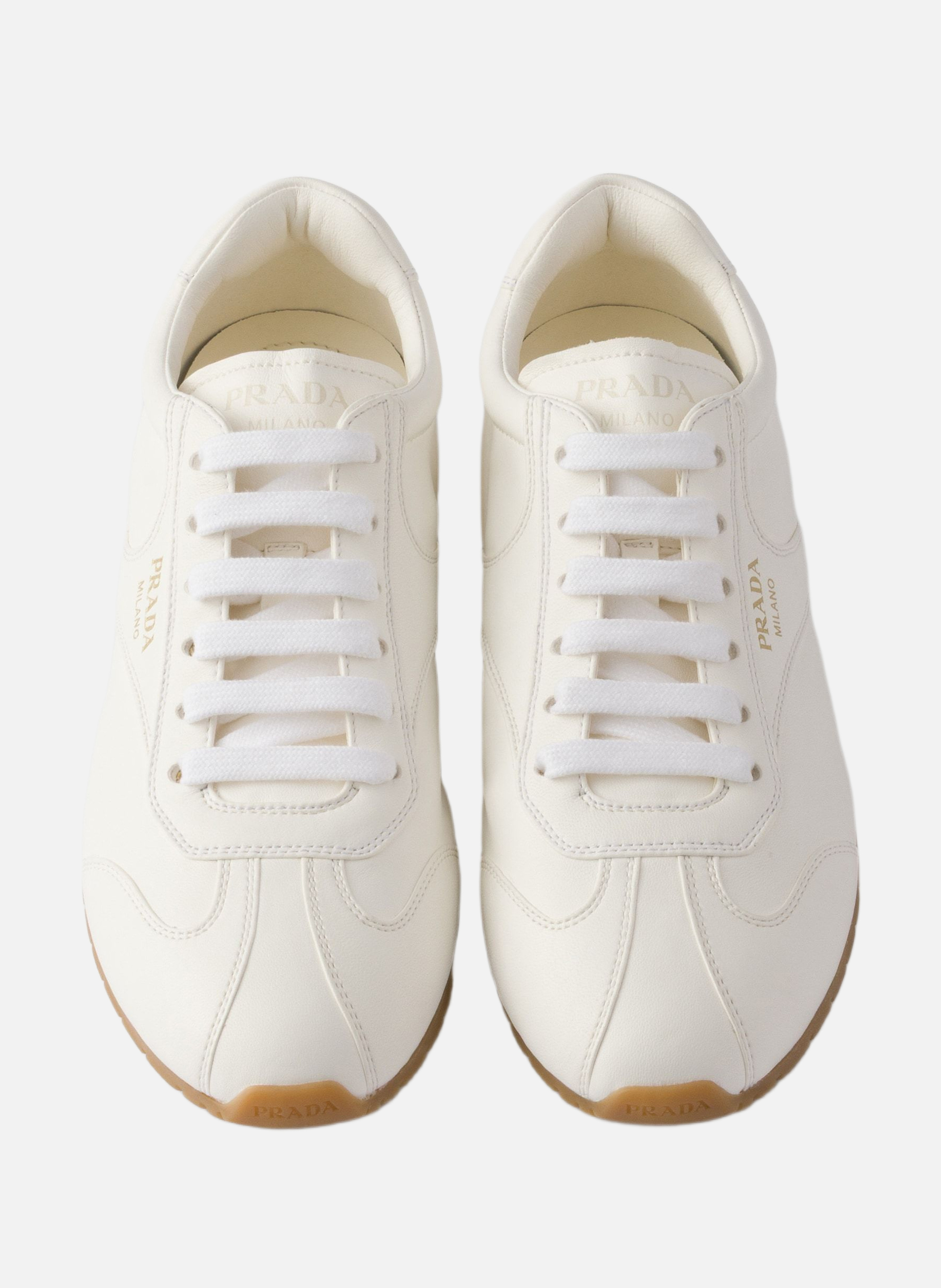 Sneakers en cuir nappa PRADA Beige