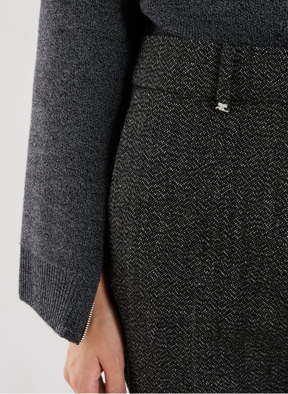 Boot-cut wool woven trousers | Black by COURRÈGES Boot-cut wool woven trousers Black