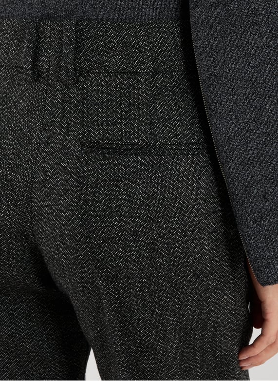 Boot-cut wool woven trousers | Black by COURRÈGES Boot-cut wool woven trousers Black