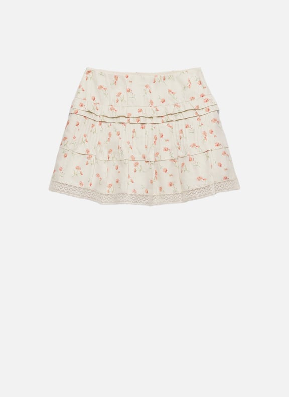 Jupe courte en lin à imprimé fleurs Beige by PRADA PRADA Jupe courte en lin à imprimé fleurs Beige