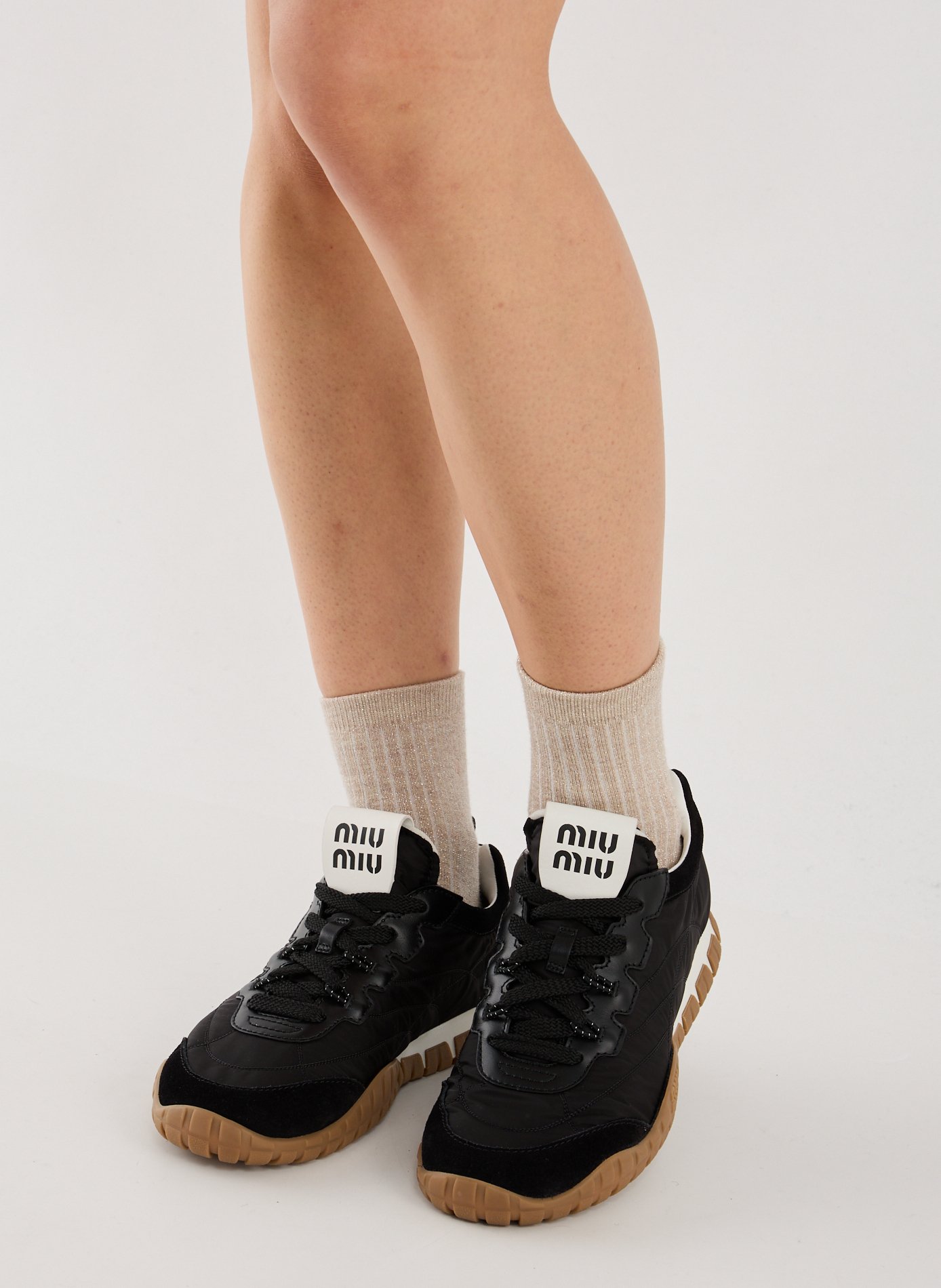 Baskets Tyre en tissu technique et cuir MIU MIU Noir