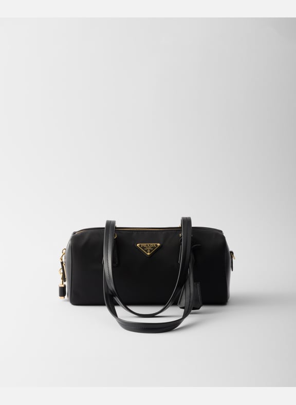 Sac à main en re-nylon et cuir avec cadenas Noir by PRADA PRADA Sac à main en re-nylon et cuir avec cadenas Noir