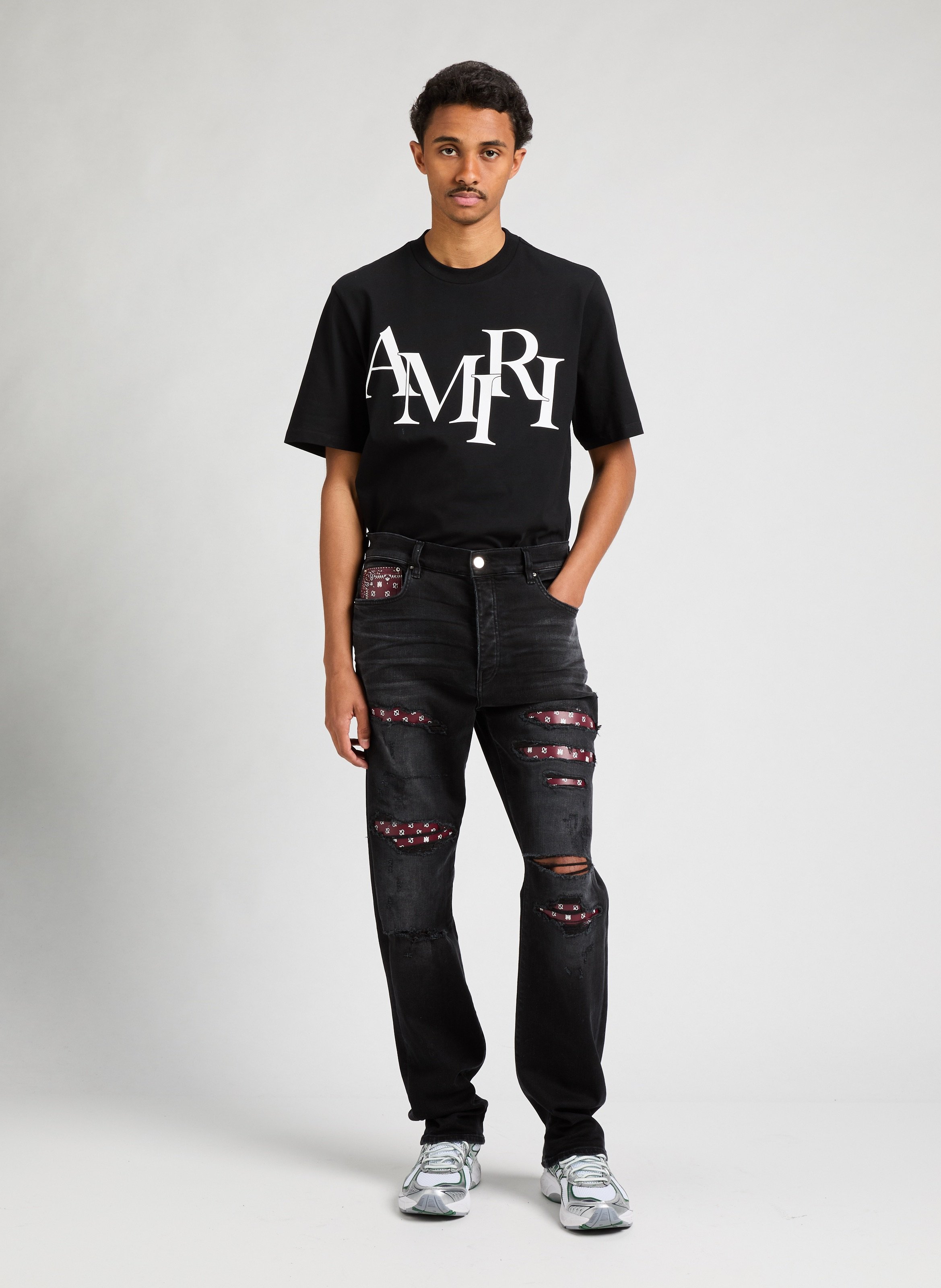 Ripped jeans with paisley patches AMIRI Black