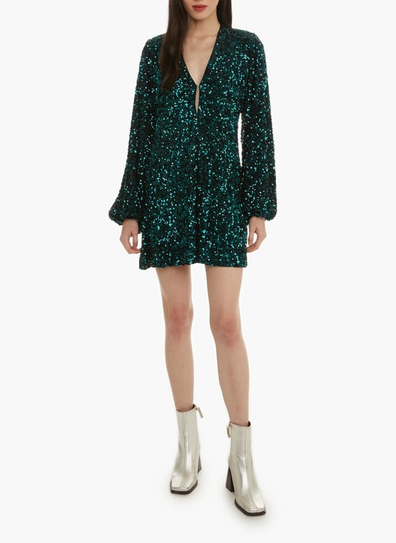 rotate green sequin dress Wearing: Green Sequin Puff Sleeve Dress by Rotate