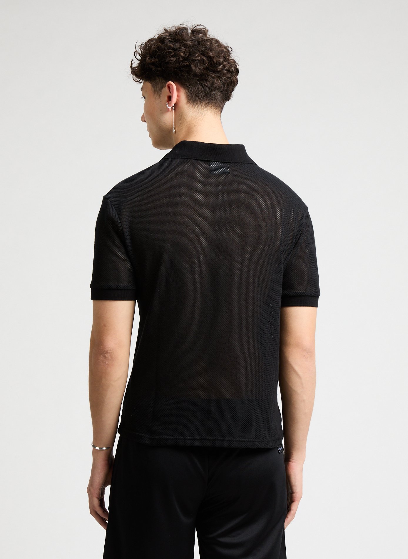Polo manches courtes en mesh COURRÈGES Noir