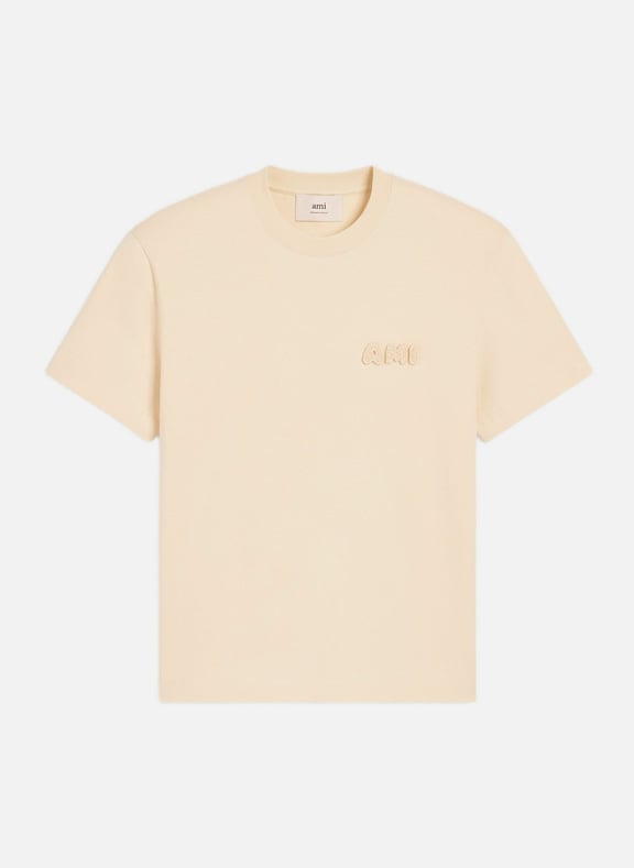 T-shirt en coton avec patch ami unisexe Beige by AMI PARIS AMI PARIS T-shirt en coton avec patch ami unisexe Beige