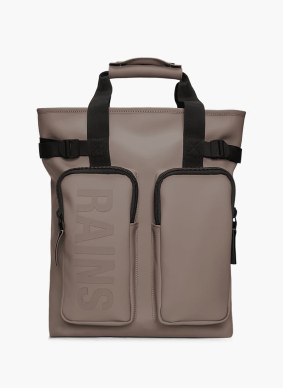 rains backpack beige Mini | Backpack | Silhouette is characterized by its squared shape and flap with magnet snap fastenings.This clean and ever contemporary rucksack features an internal laptop pocket Texel Beige Rains backpack -