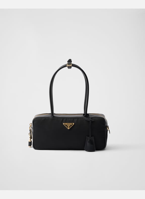 Petit sac à main en re-nylon et cuir avec cadenas Noir by PRADA PRADA Petit sac à main en re-nylon et cuir avec cadenas Noir