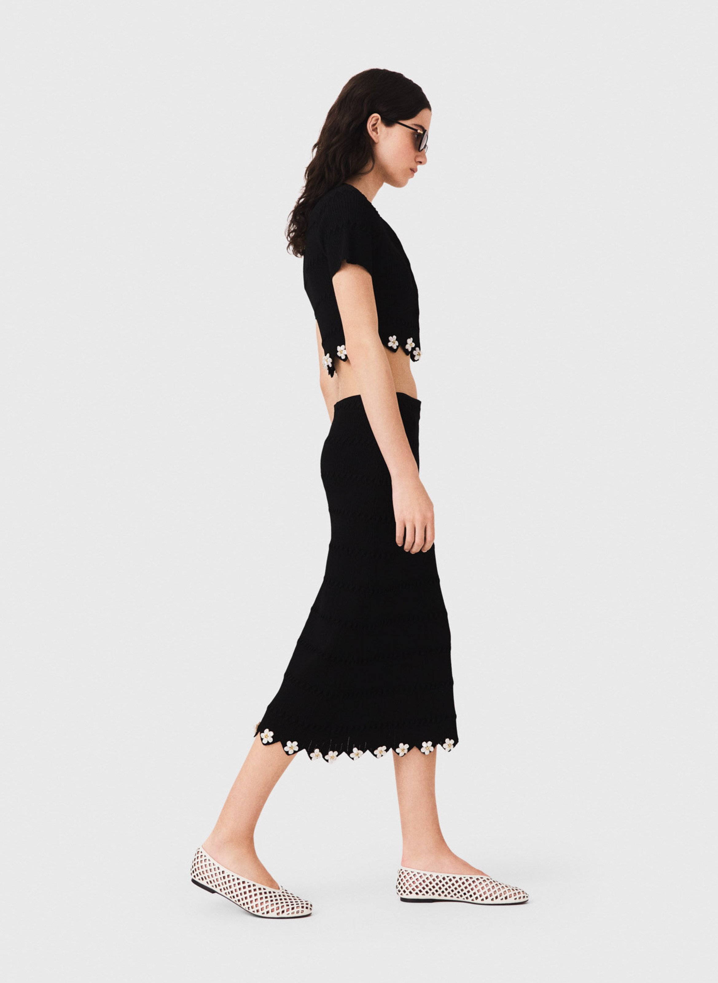 Jupe midi ajustée en maille avec strass fleurs MAJE Noir