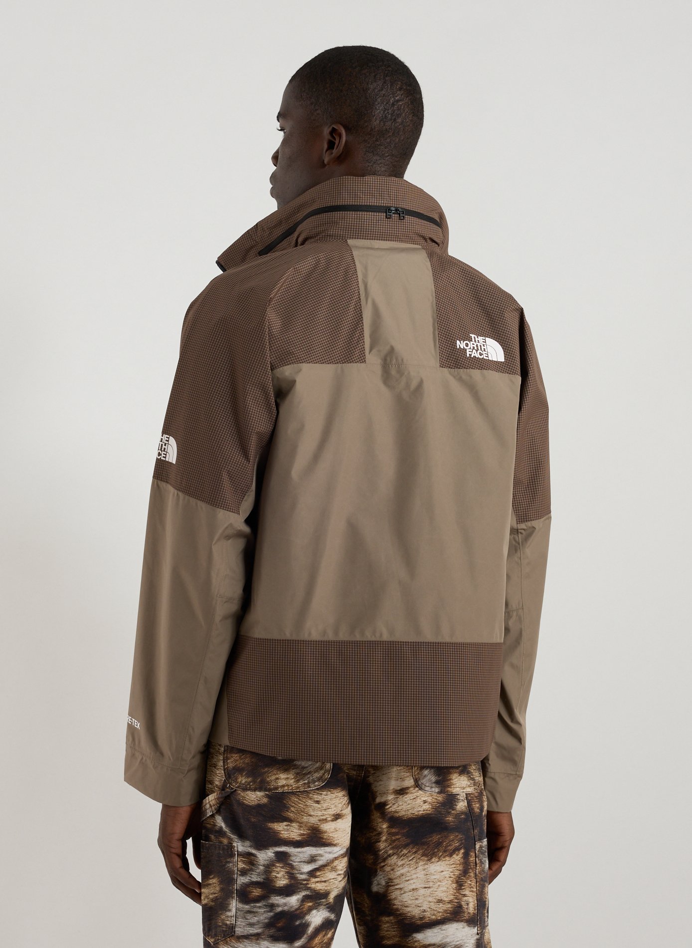 Oversized windbreaker coat THE NORTH FACE Brown