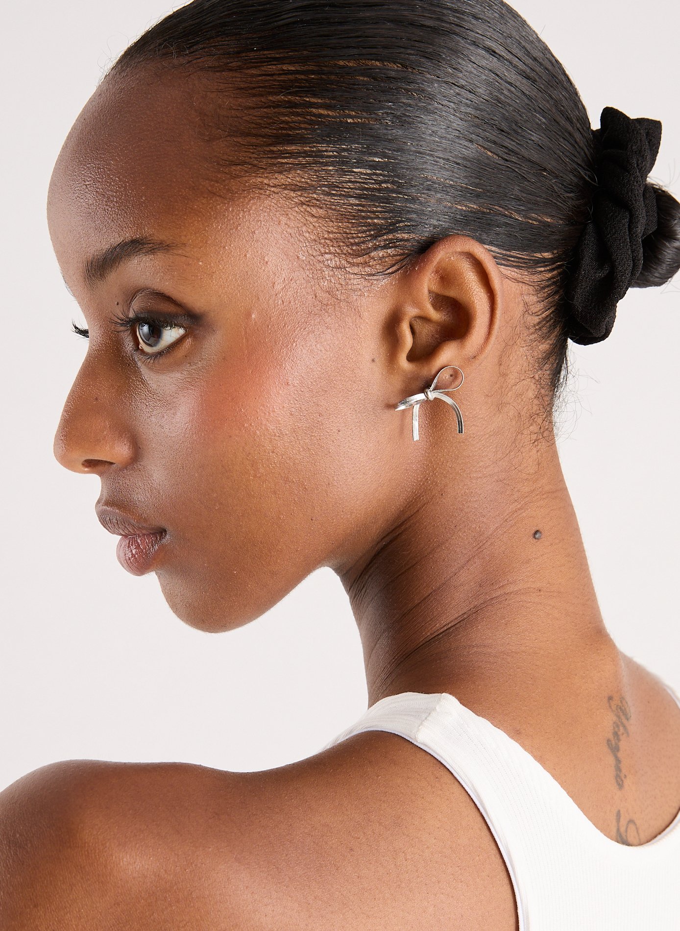 Bow earrings AU PRINTEMPS PARIS Silver