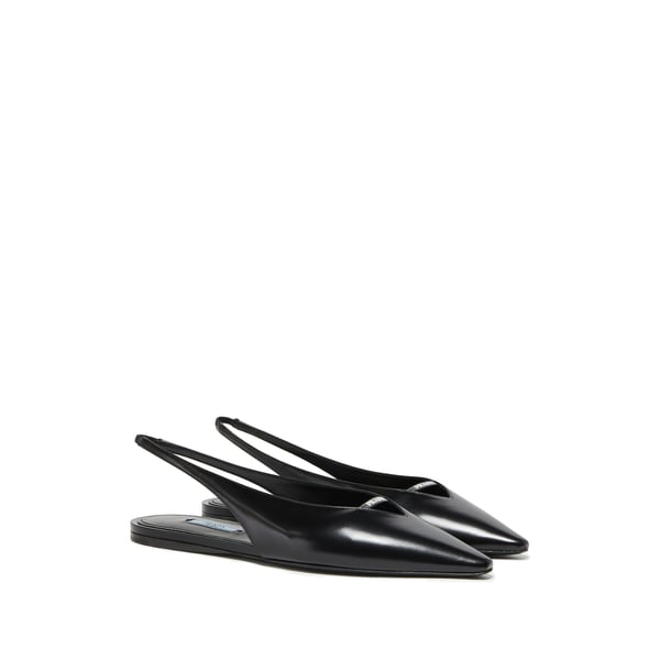 Sandale à bout pointu et bride en cuir