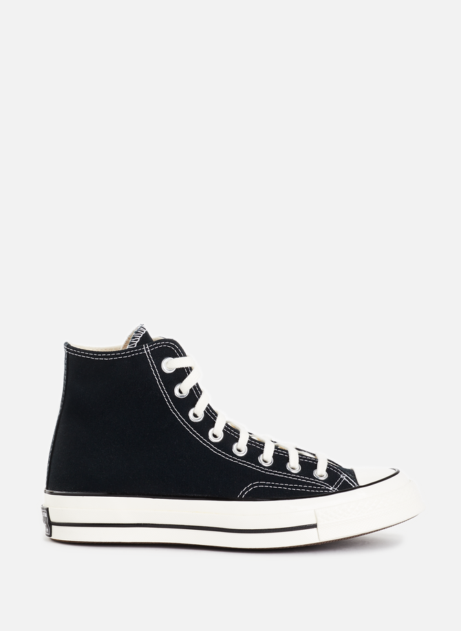 High-top sneakers Plain appearance Round toe Lace-up closure Embroidered logo on side and patch on heel Padded sole: 4 cm CONVERSE