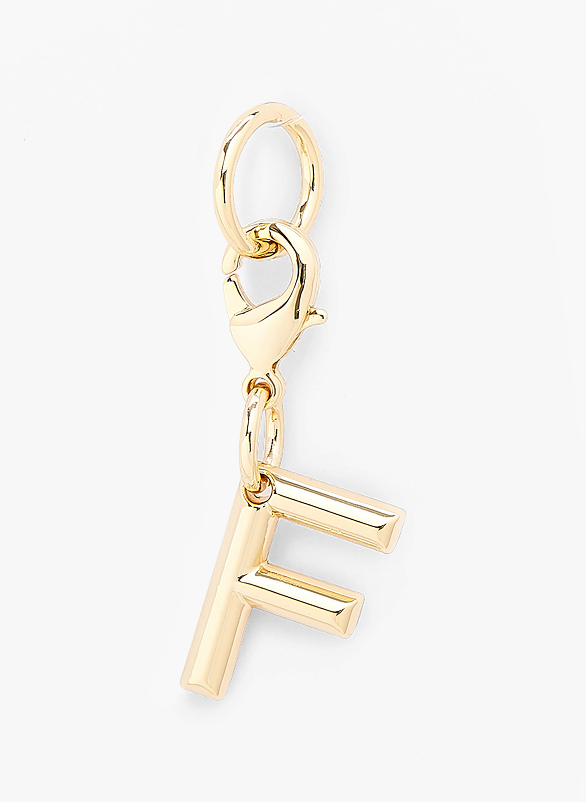Porte-clé métallique doré lancel en forme de lettre f, finition polie. LANCEL Doré
