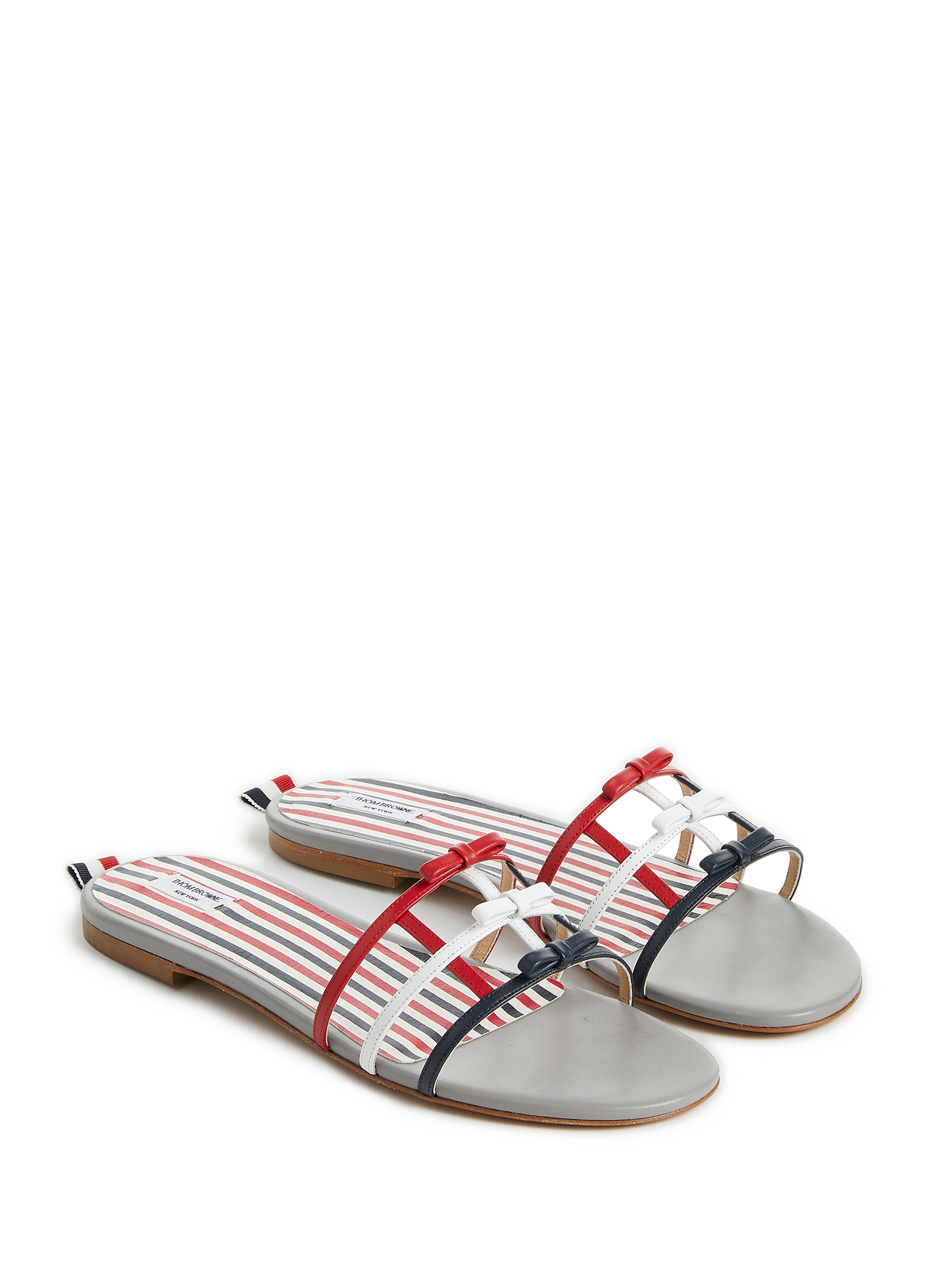 Claquettes avec noeuds en cuir