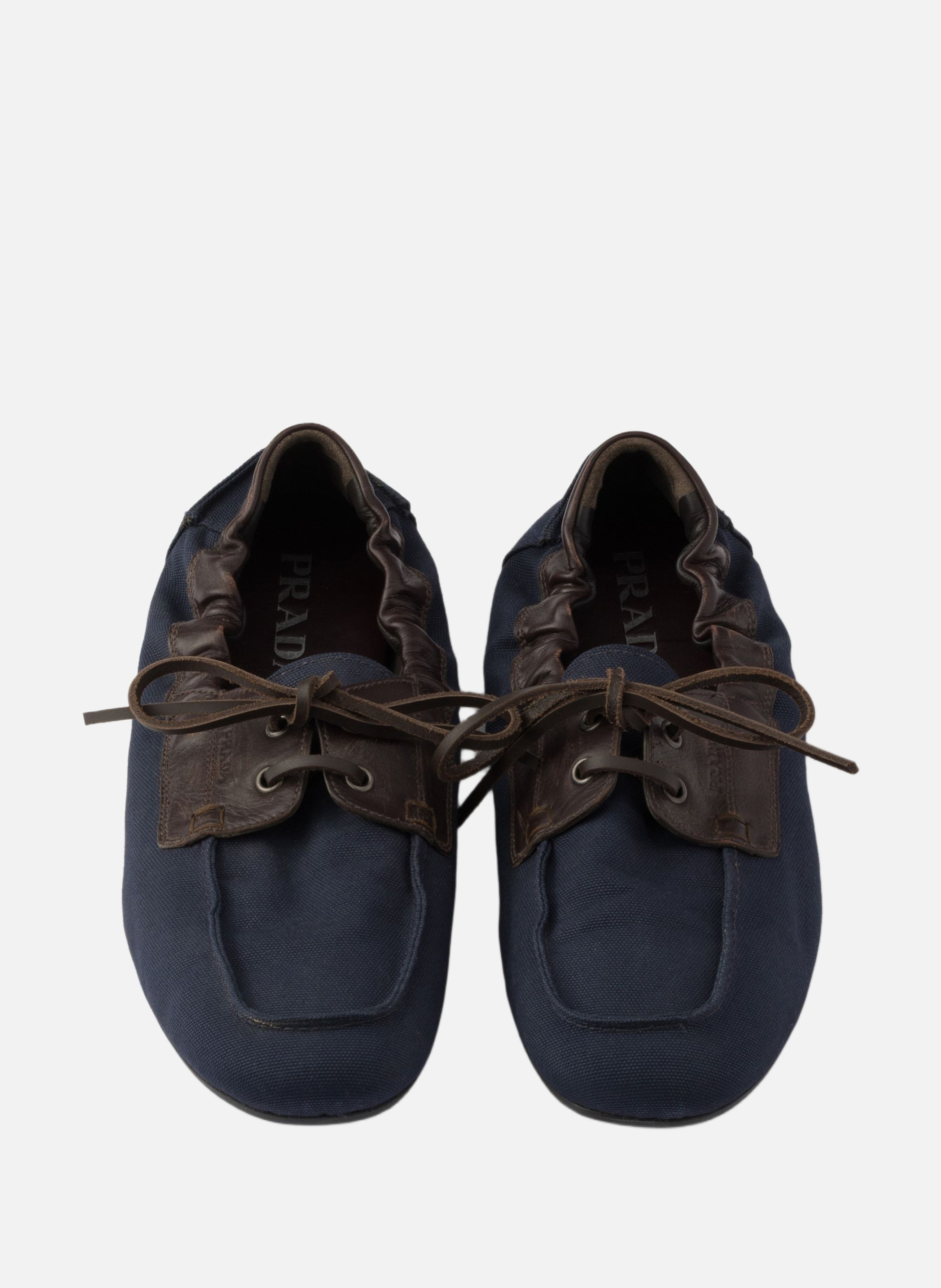 Chaussures bateau en toile vieillie et cuir PRADA Bleu