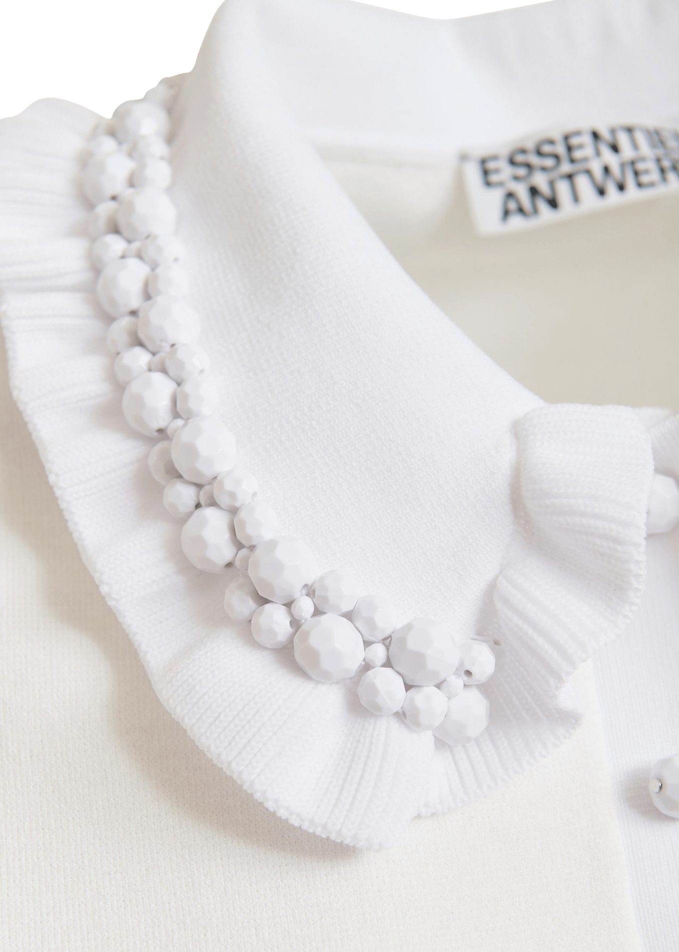 Polo manches courtes uni à volants jewelry ESSENTIEL ANTWERP Blanc