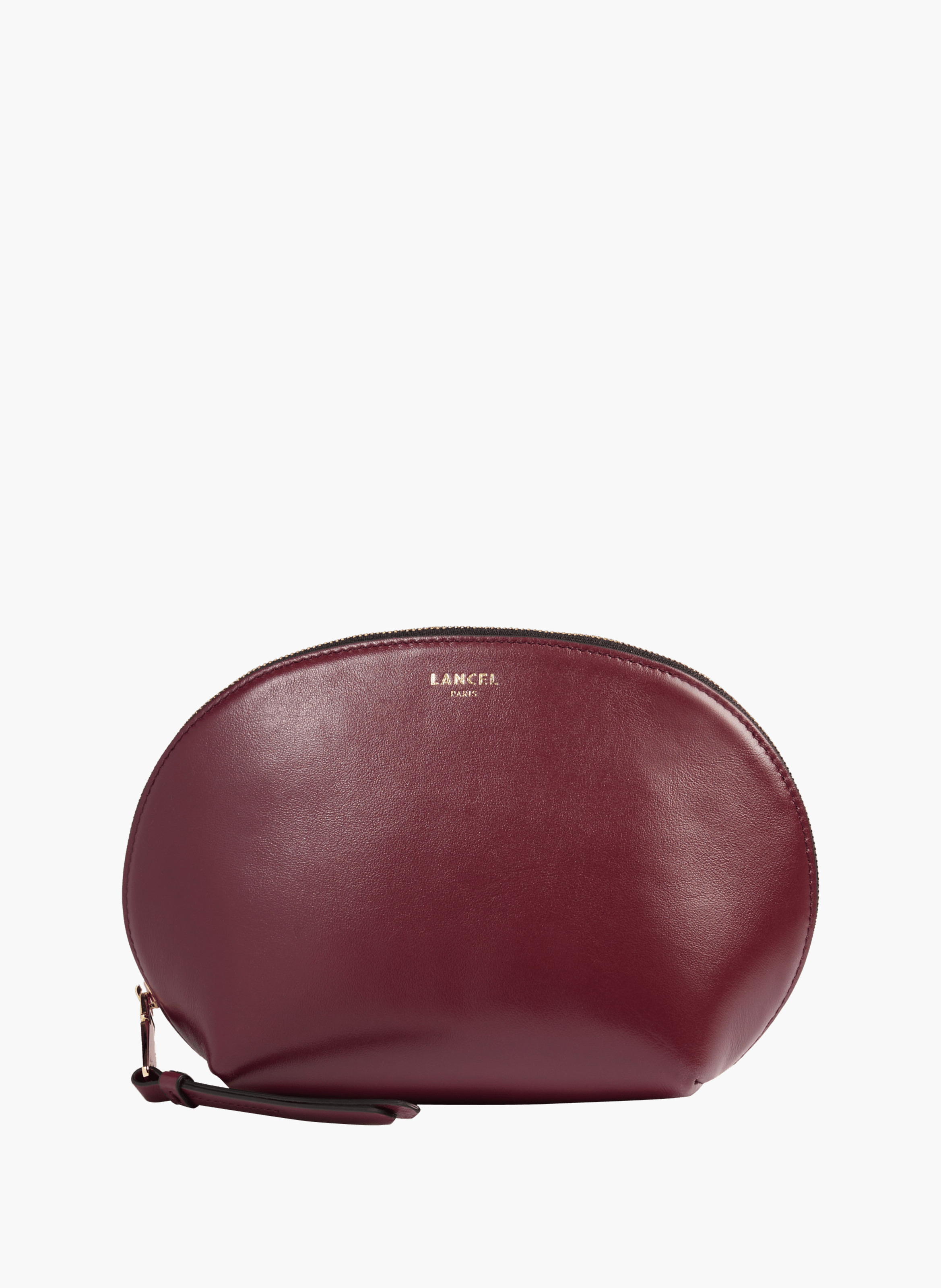 Cosmetische etui van Lancel in leder. LANCEL Paars