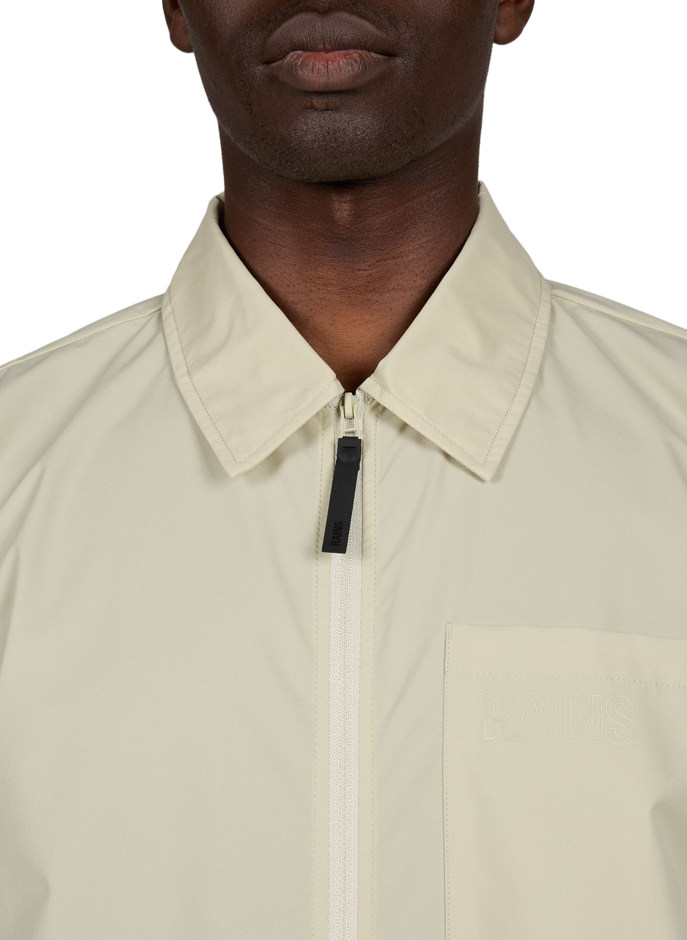 Classic straight solid color jacket with classic collar. RAINS Green