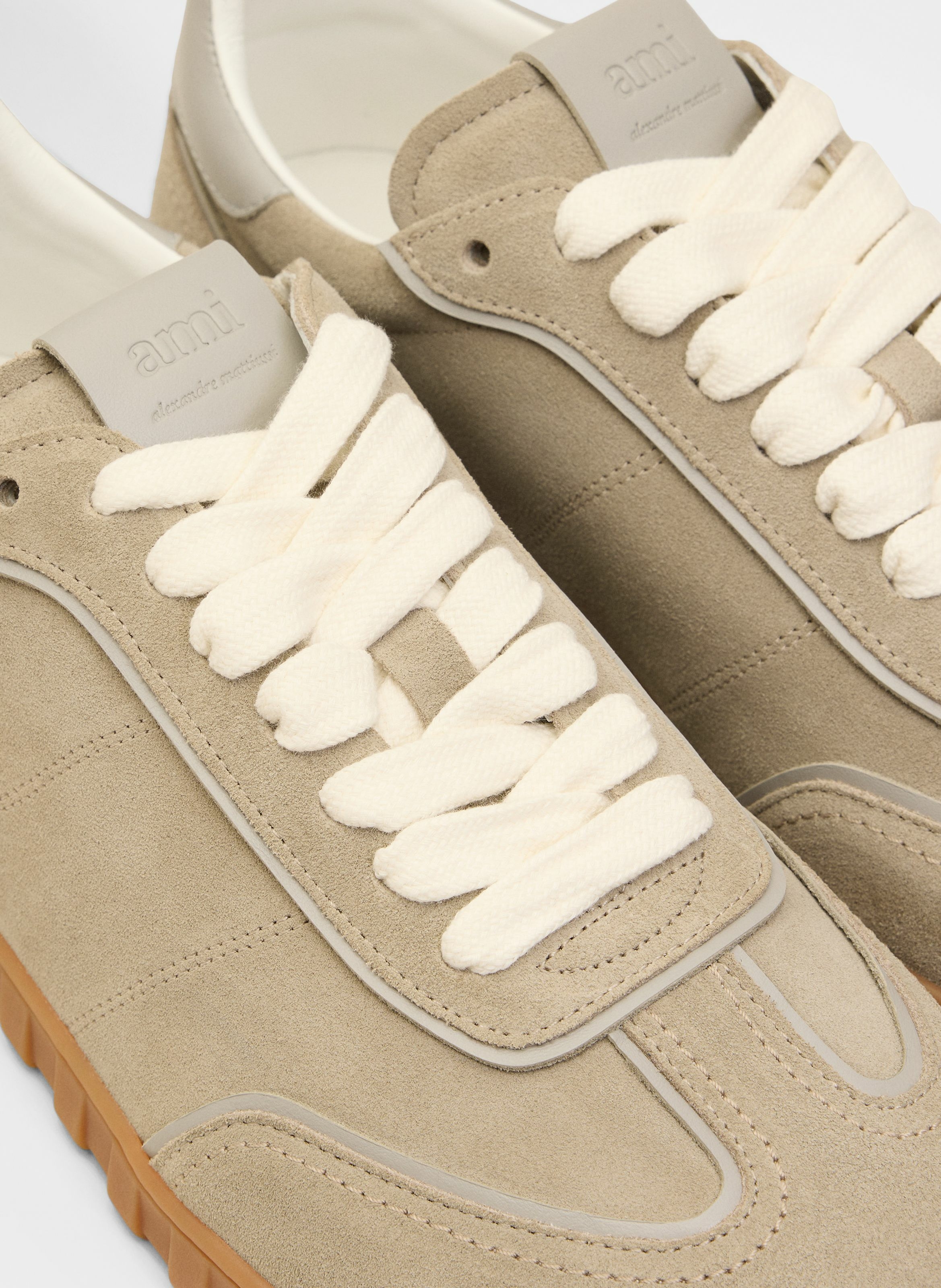 Baskets step basses unisexe AMI PARIS Gris