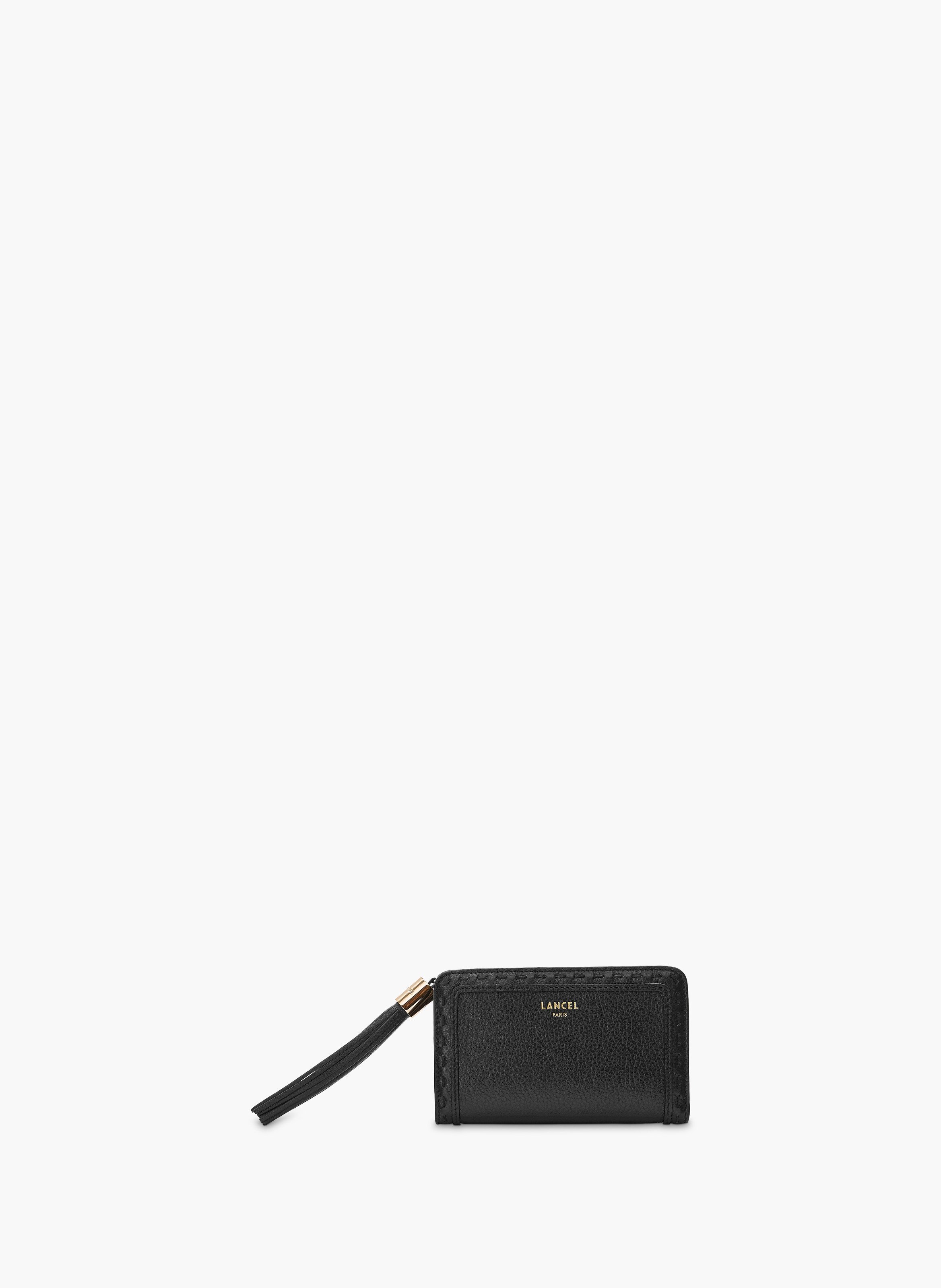 Compacte rechthoekige portefeuille van Lancel's Premier Flirt in leer.  Noir