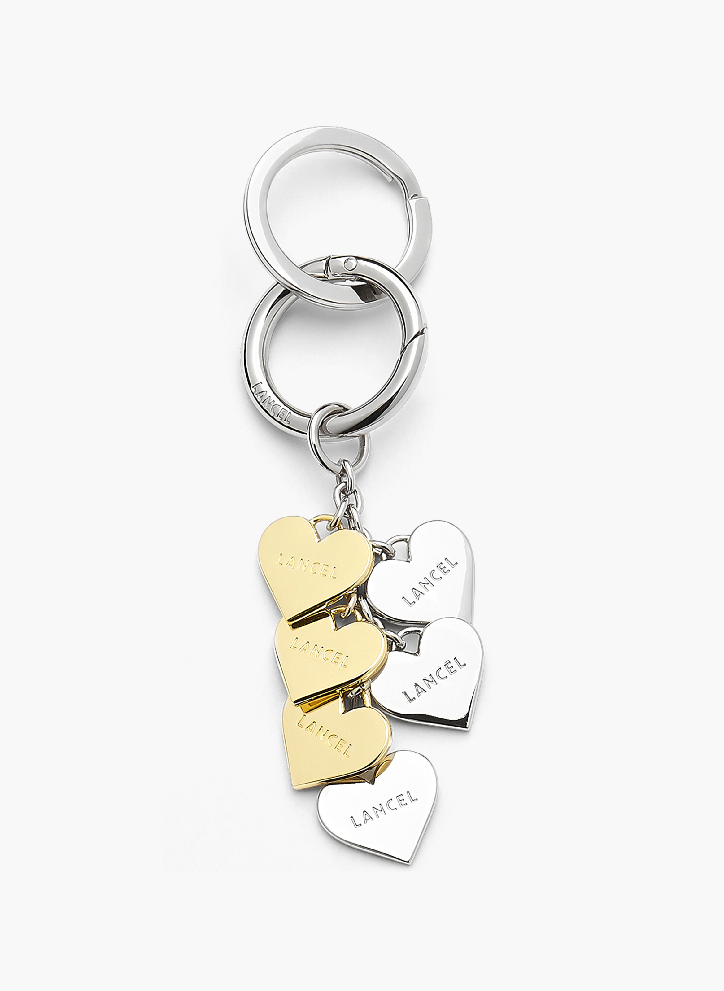 Sleutelhanger met bedeltjes van Lancel. LANCEL Zilver