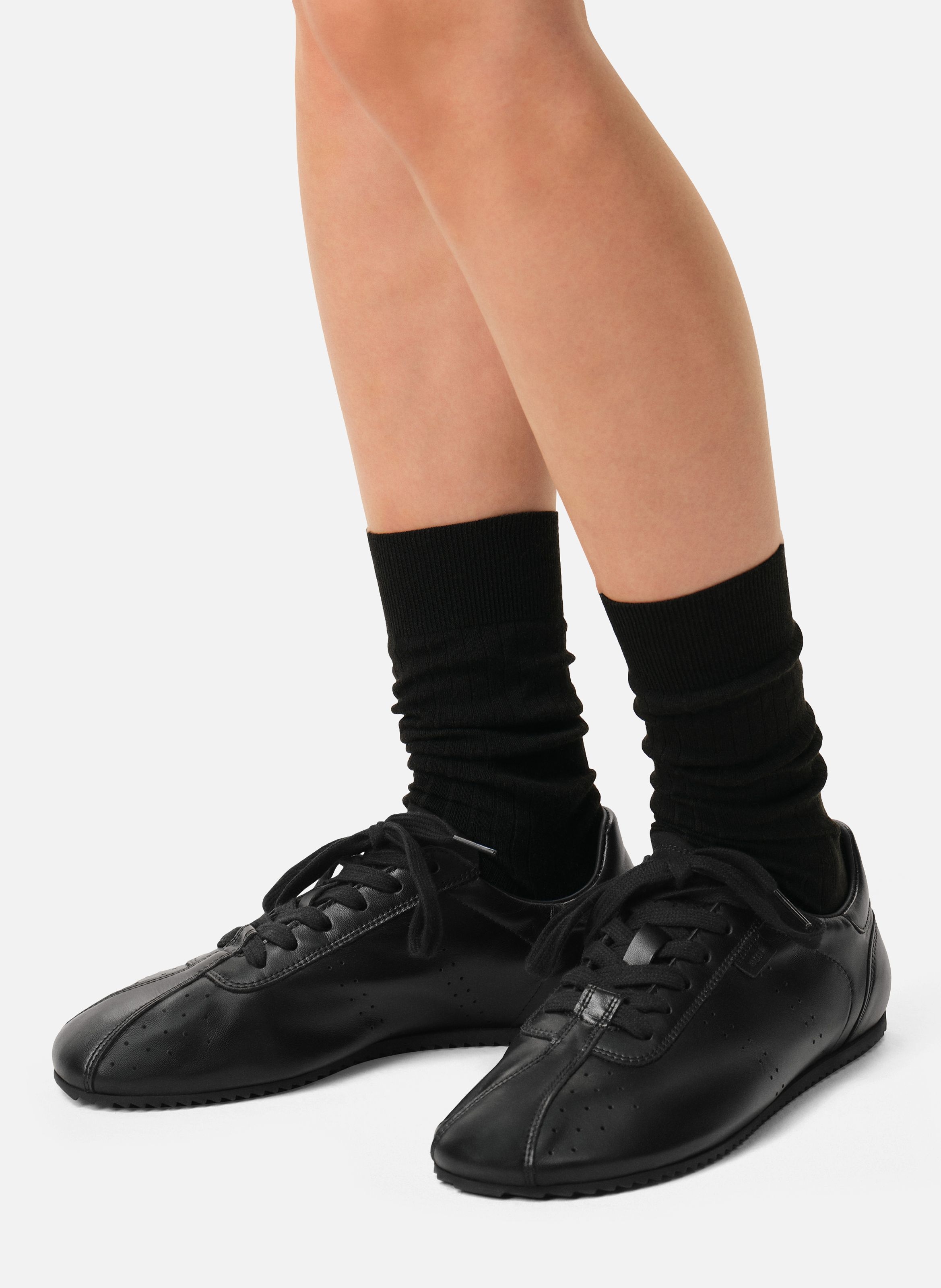 Baskets Soft Basses En Cuir Lisse unisexes AMI PARIS Noir