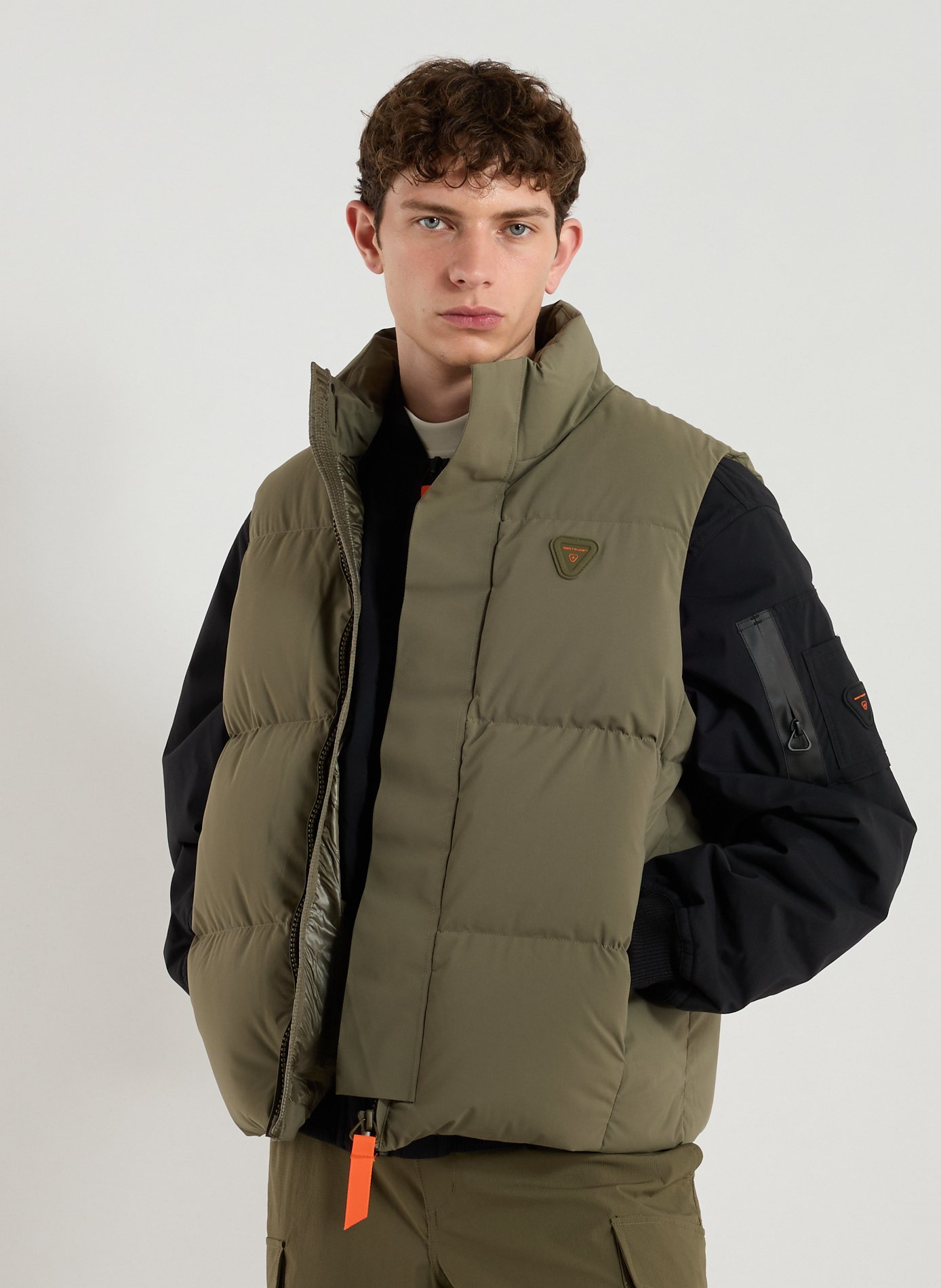 Sleeveless high-neck puffer vest Khaki by GERTRUDE ET GASTON GERTRUDE ET GASTON Sleeveless high-neck puffer vest Khaki