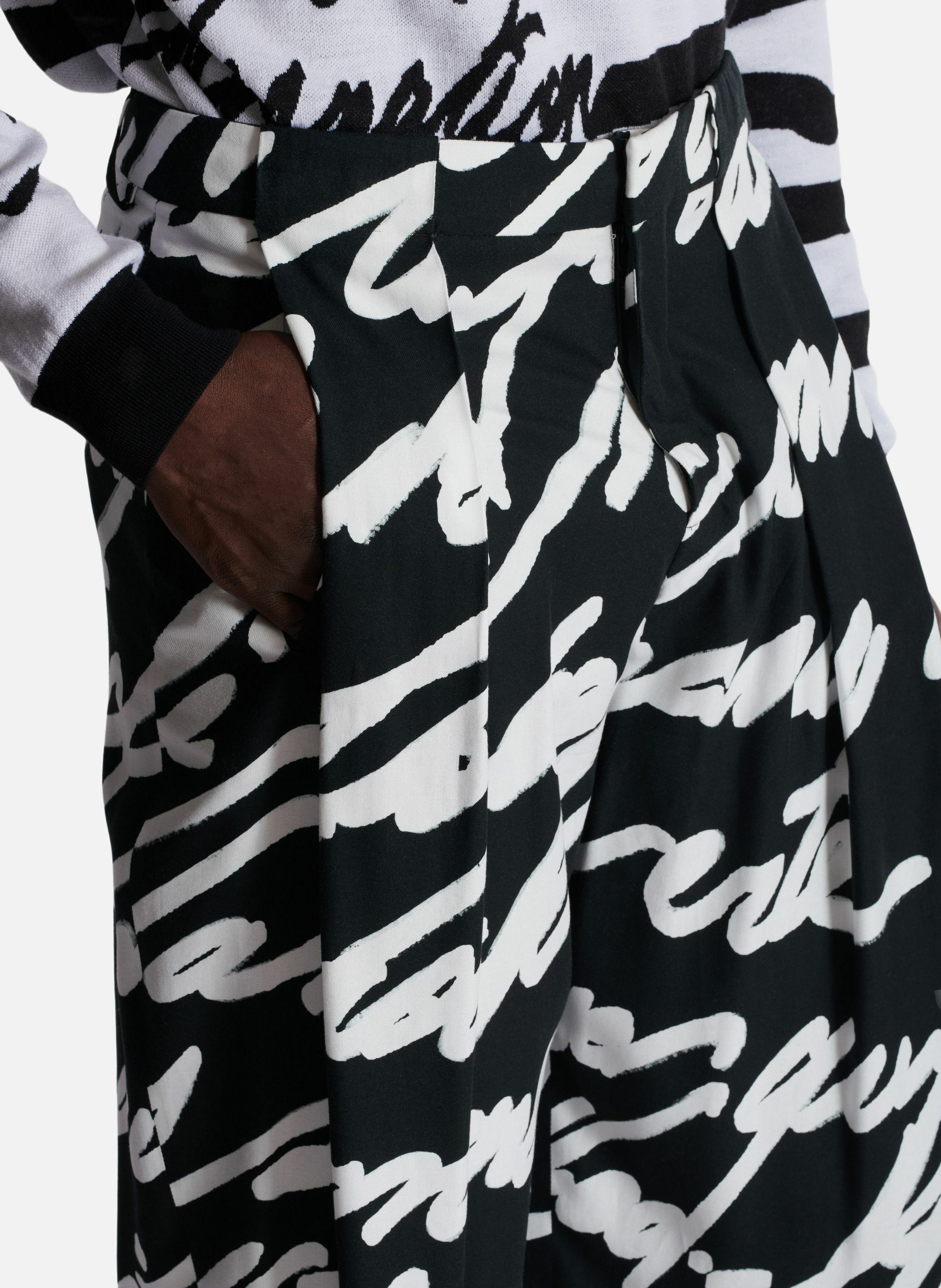 Pantalon à plis imprimé « lettre d'amour » BALMAIN Noir