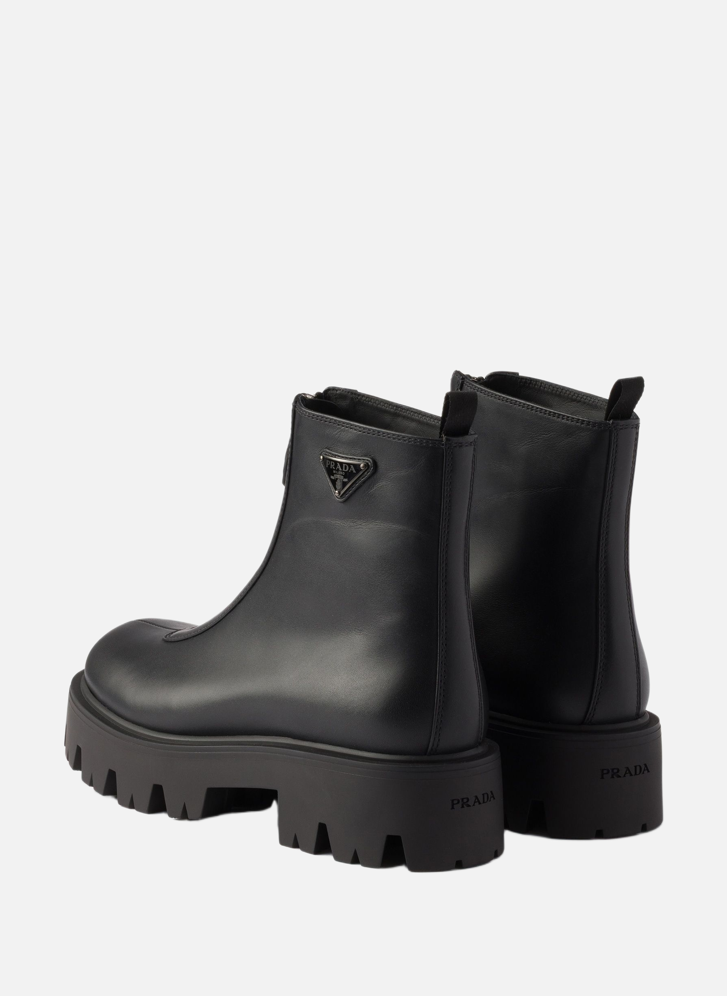 Bottines en cuir avec fermeture à glissière PRADA Noir