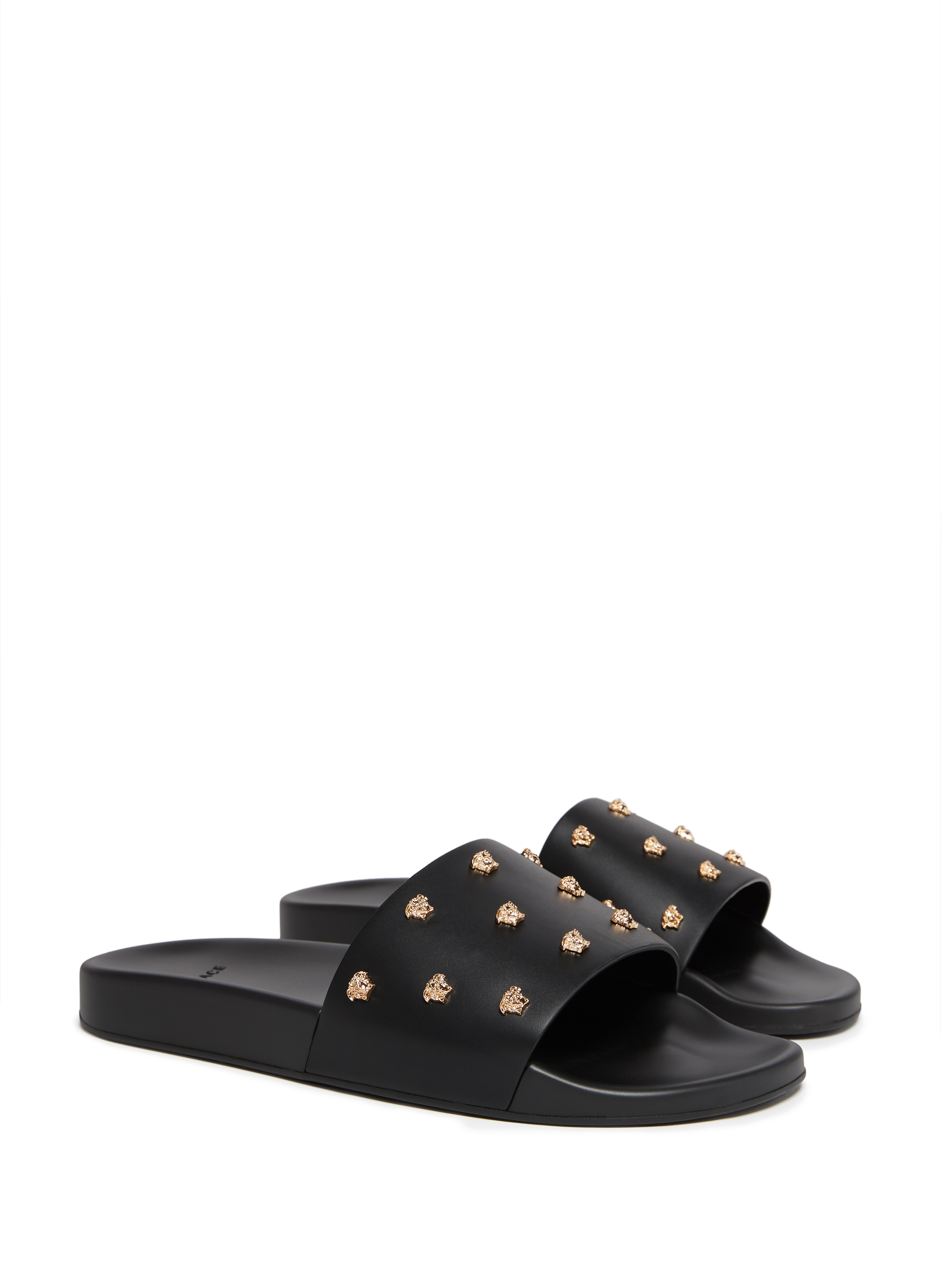 CLAQUETTES EN CUIR MEDUSA STUD