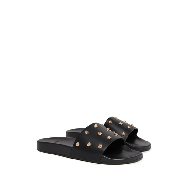 CLAQUETTES EN CUIR MEDUSA STUD